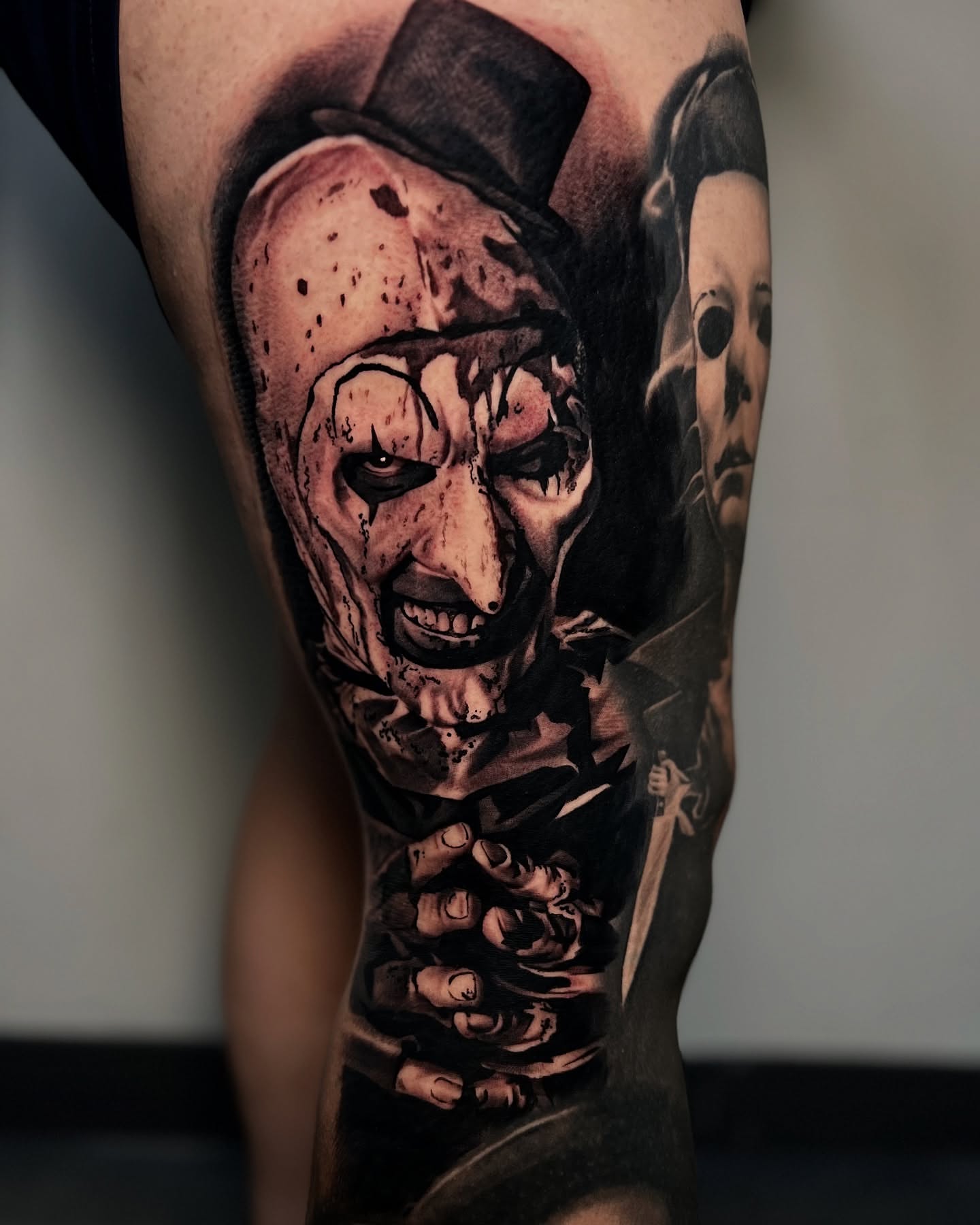 Clown and Michael Myers realism tattoo on the forearm by James Foltz