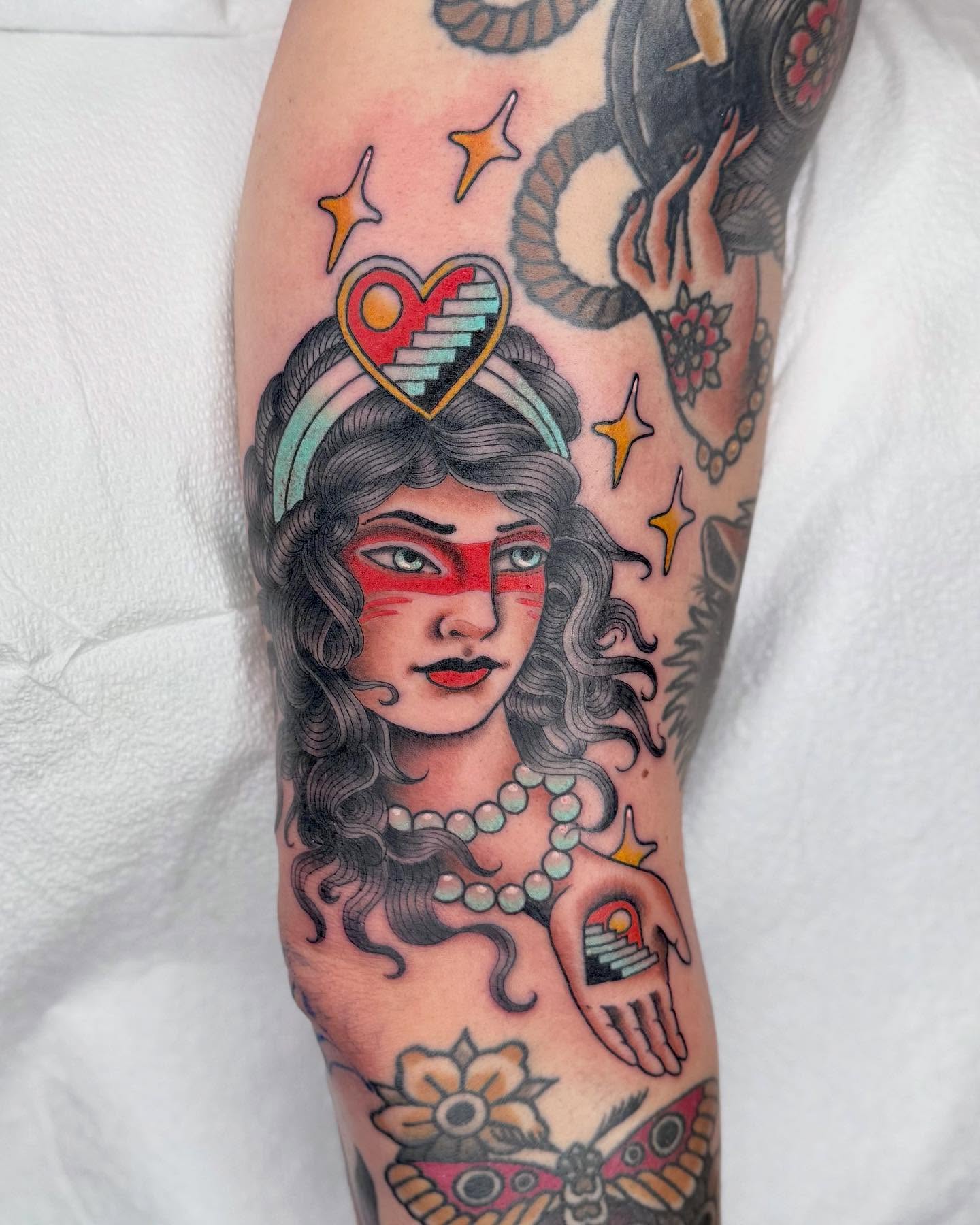 Woman with heart American traditional tattoo on the forearm by Curtis Stairs, Seattle, Washington