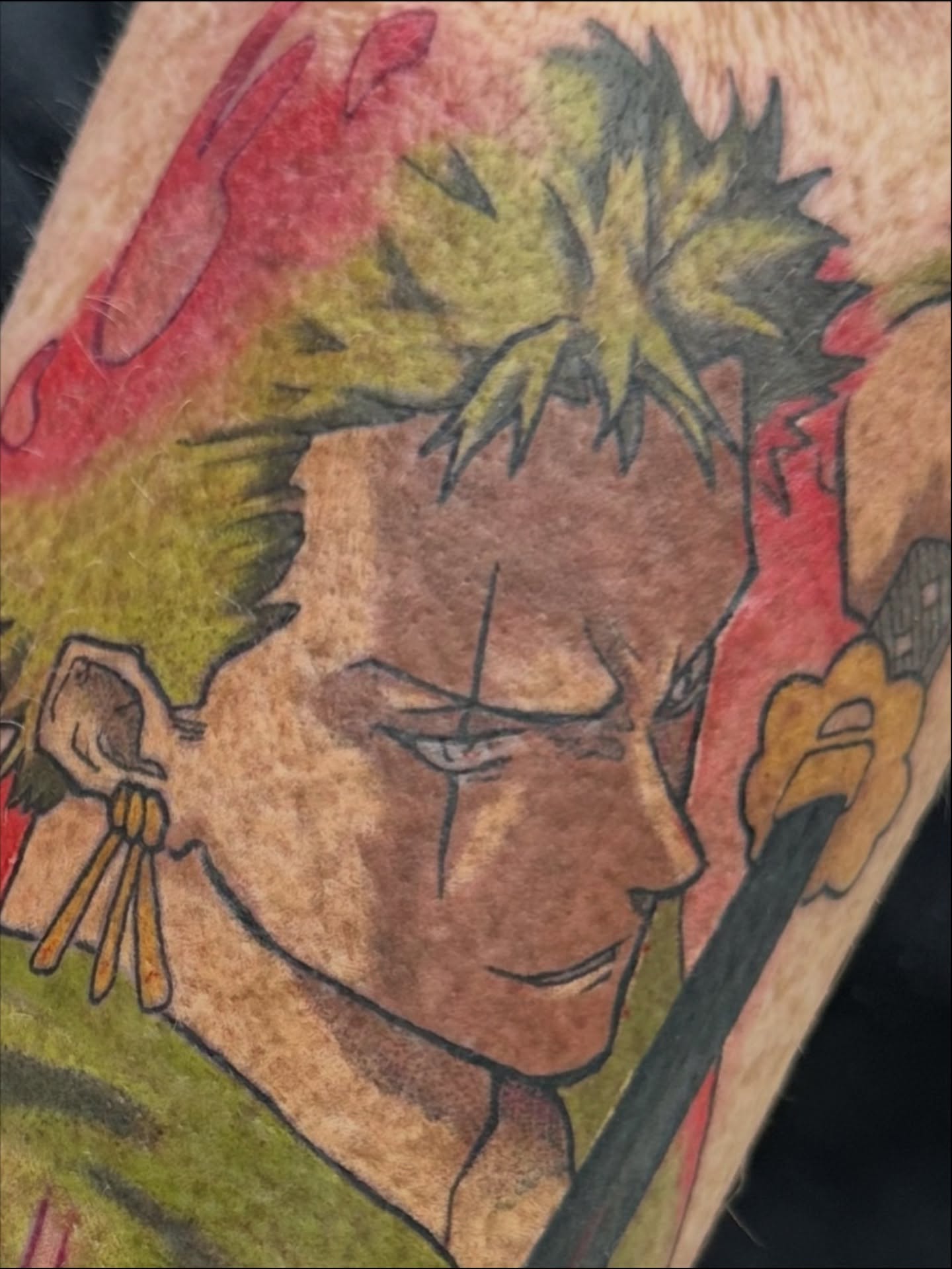 Anime character anime tattoo on the forearm by Trent Hebert