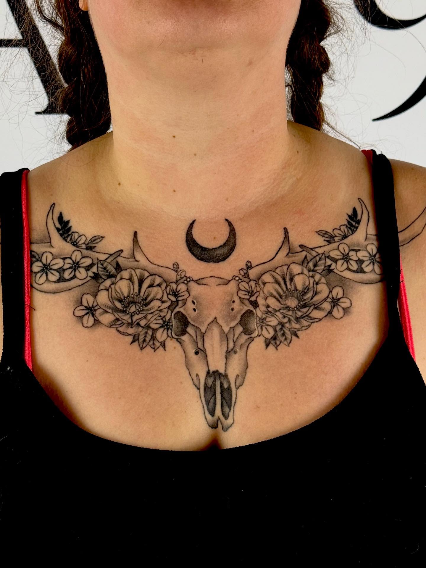 Bull skull and flowers realism tattoo on the chest by Paul Calhoun Tattoos, Englewood, Ohio