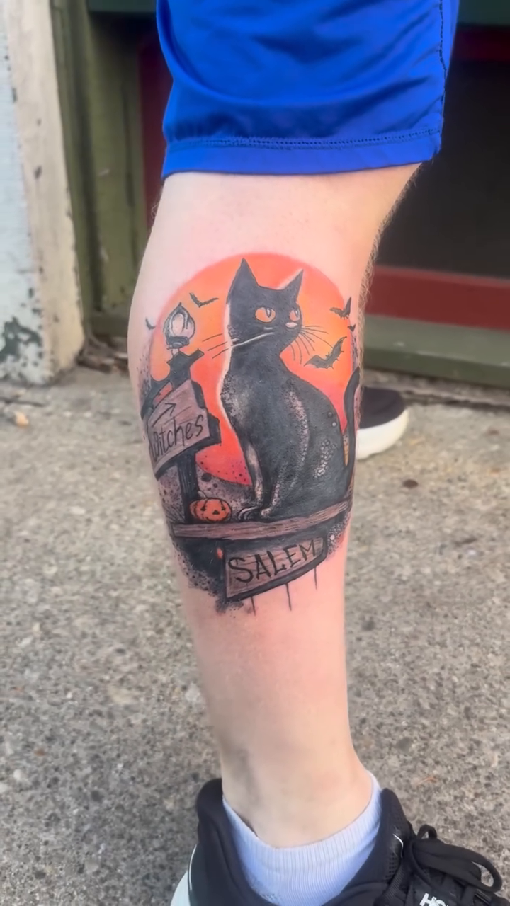 Black cat on a tombstone new school tattoo by Misty Dawn Brothers, Dayton, Ohio
