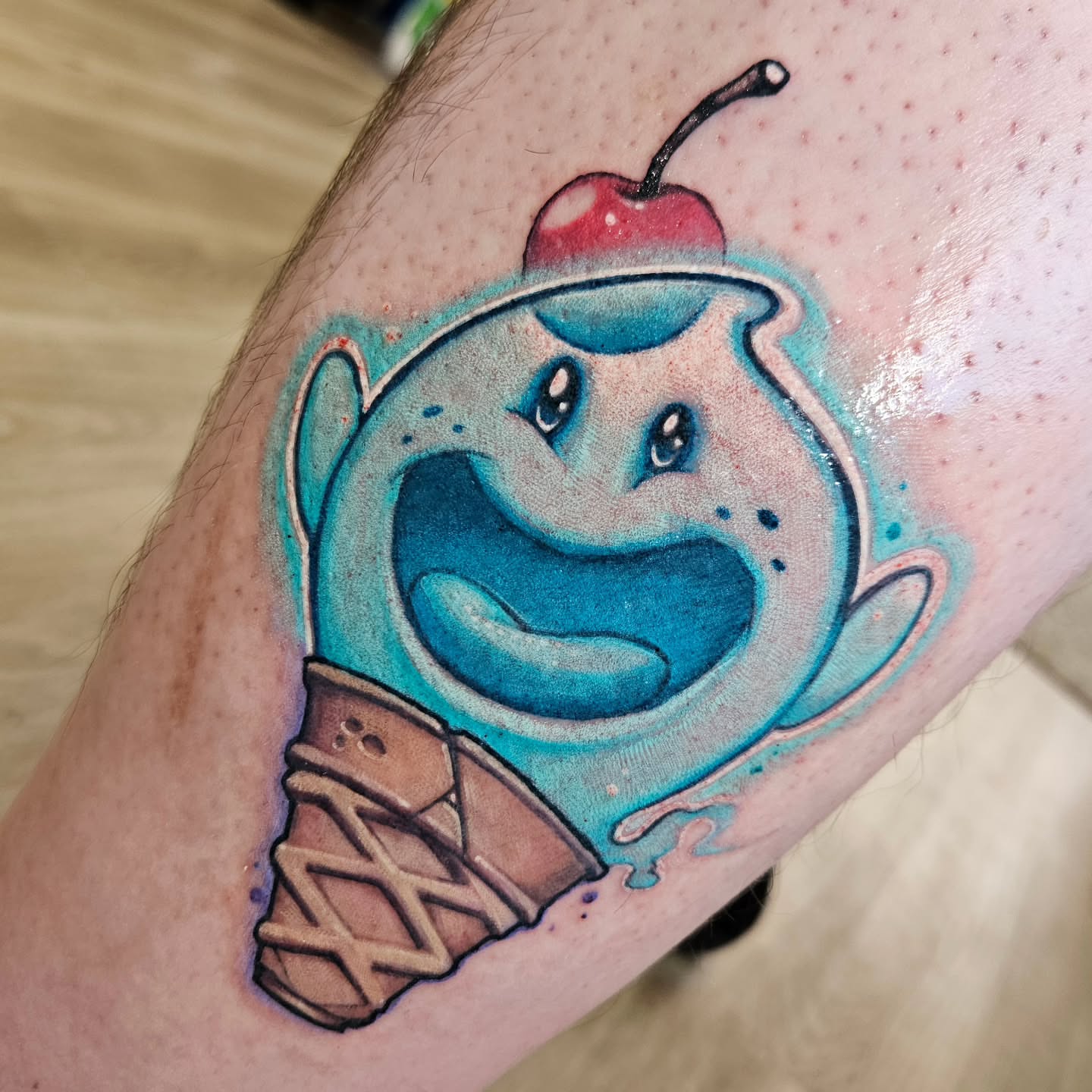 Ice cream cone new school tattoo on the forearm by Angell Tattoo Artist, Denver, Colorado