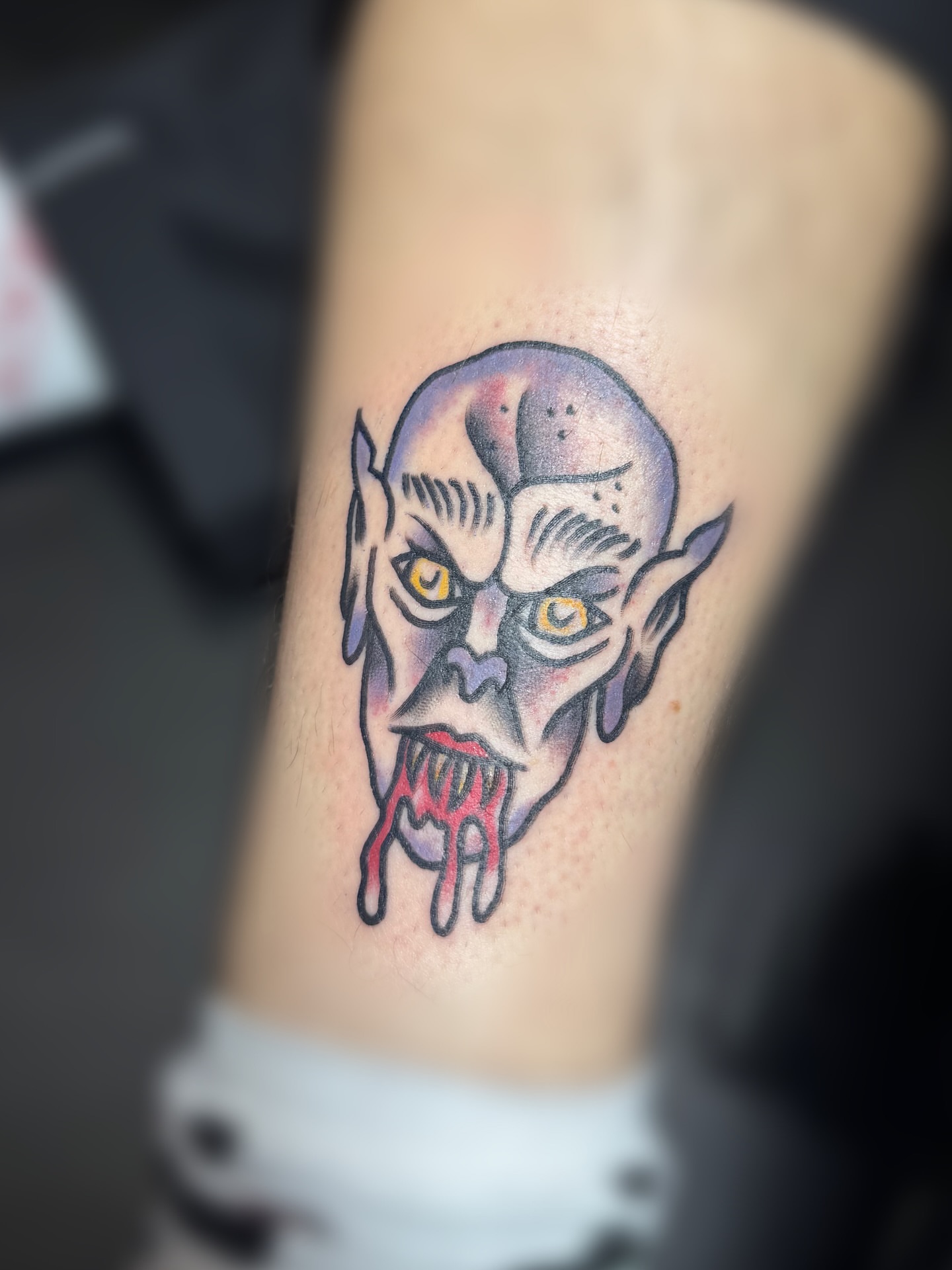 Vampire American traditional tattoo on the forearm by juice🕷tattoo artist