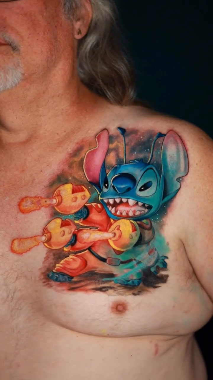 Stitch holding skewers anime tattoo by Pigmentpirate