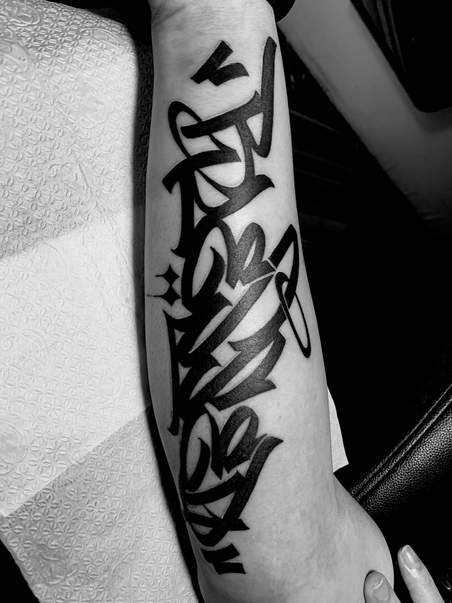 Fathers lettering script tattoo on the forearm by Gerd thINK_TATTOO