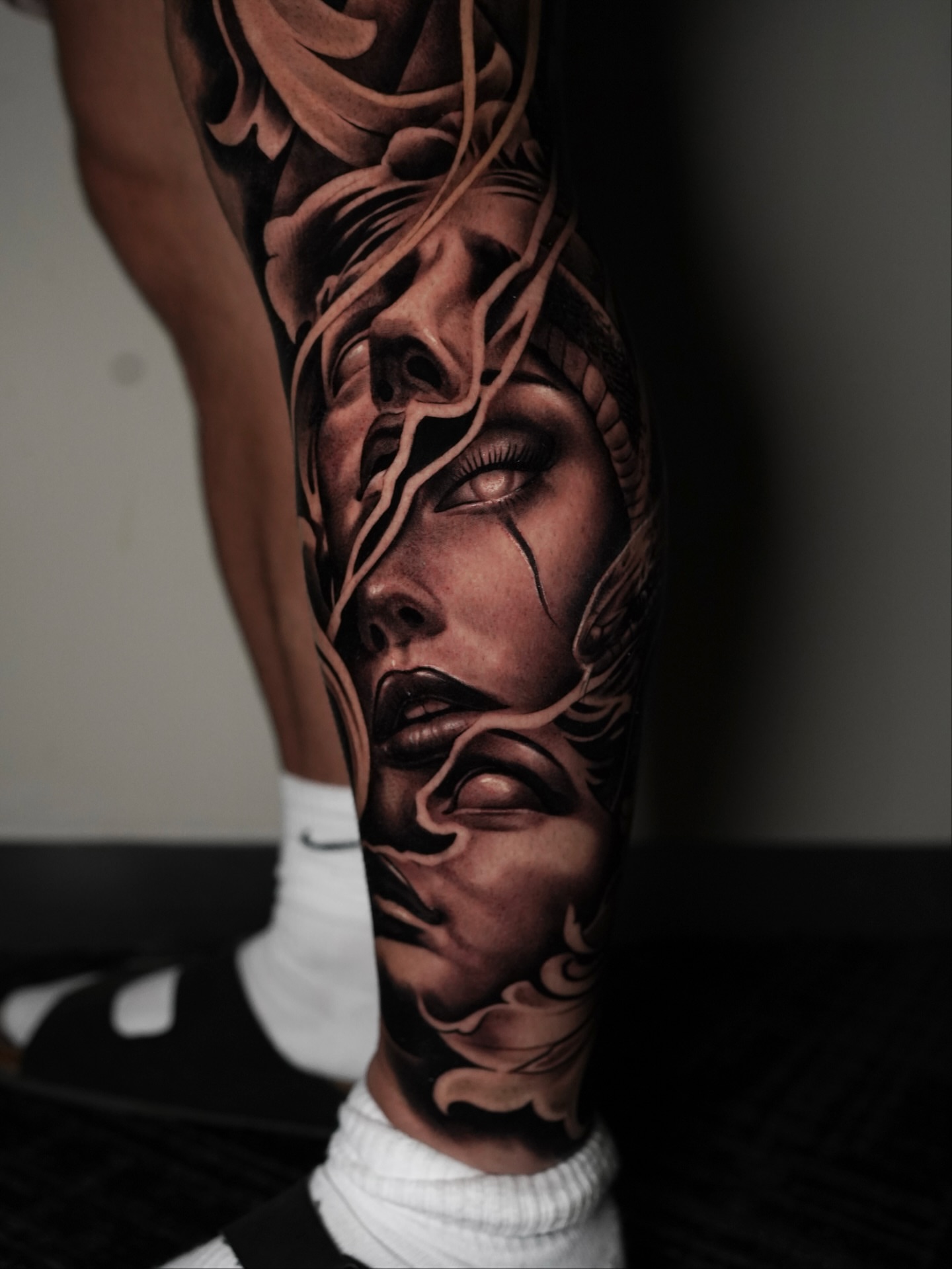 Woman's face realism tattoo on the forearm by Ivan Guadalupe guzman