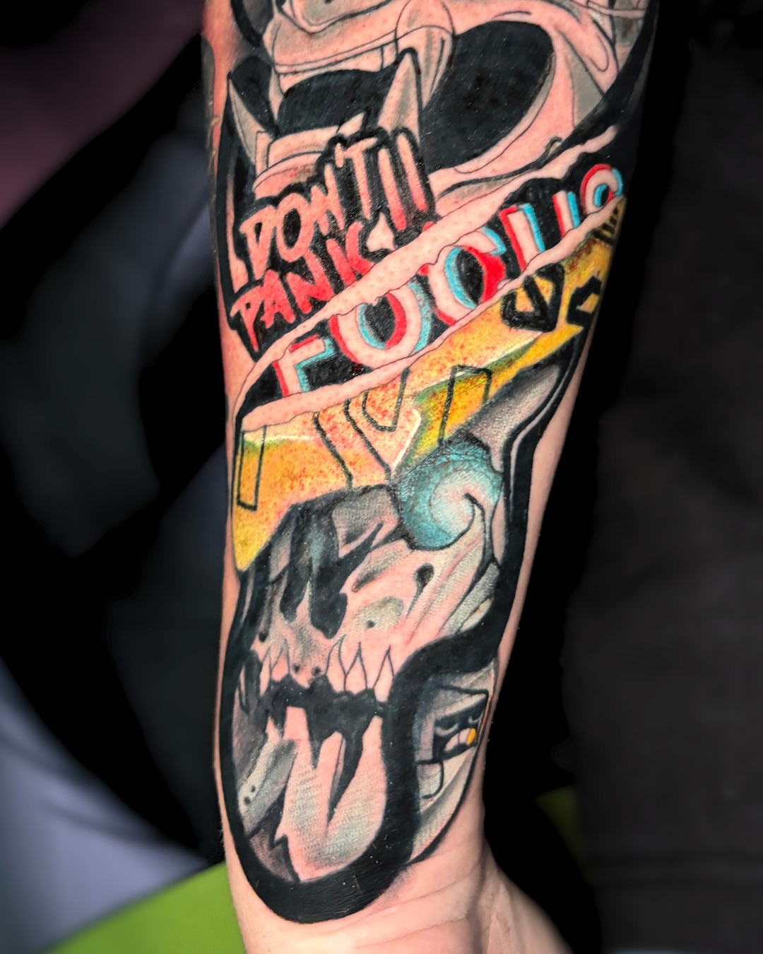 Skull with text American traditional tattoo on the forearm by Brian Overholt