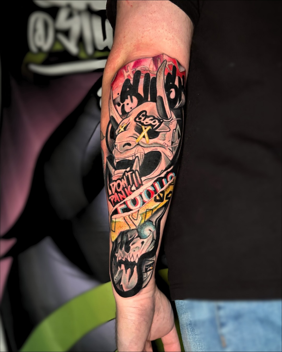 Skull and graffiti new school tattoo on the forearm by Brian Overholt