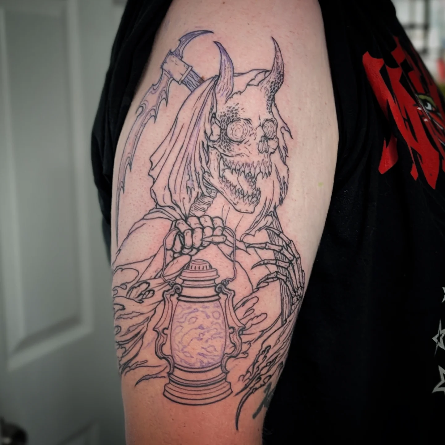 Demon with lantern dark realism tattoo on the forearm by Lorelei