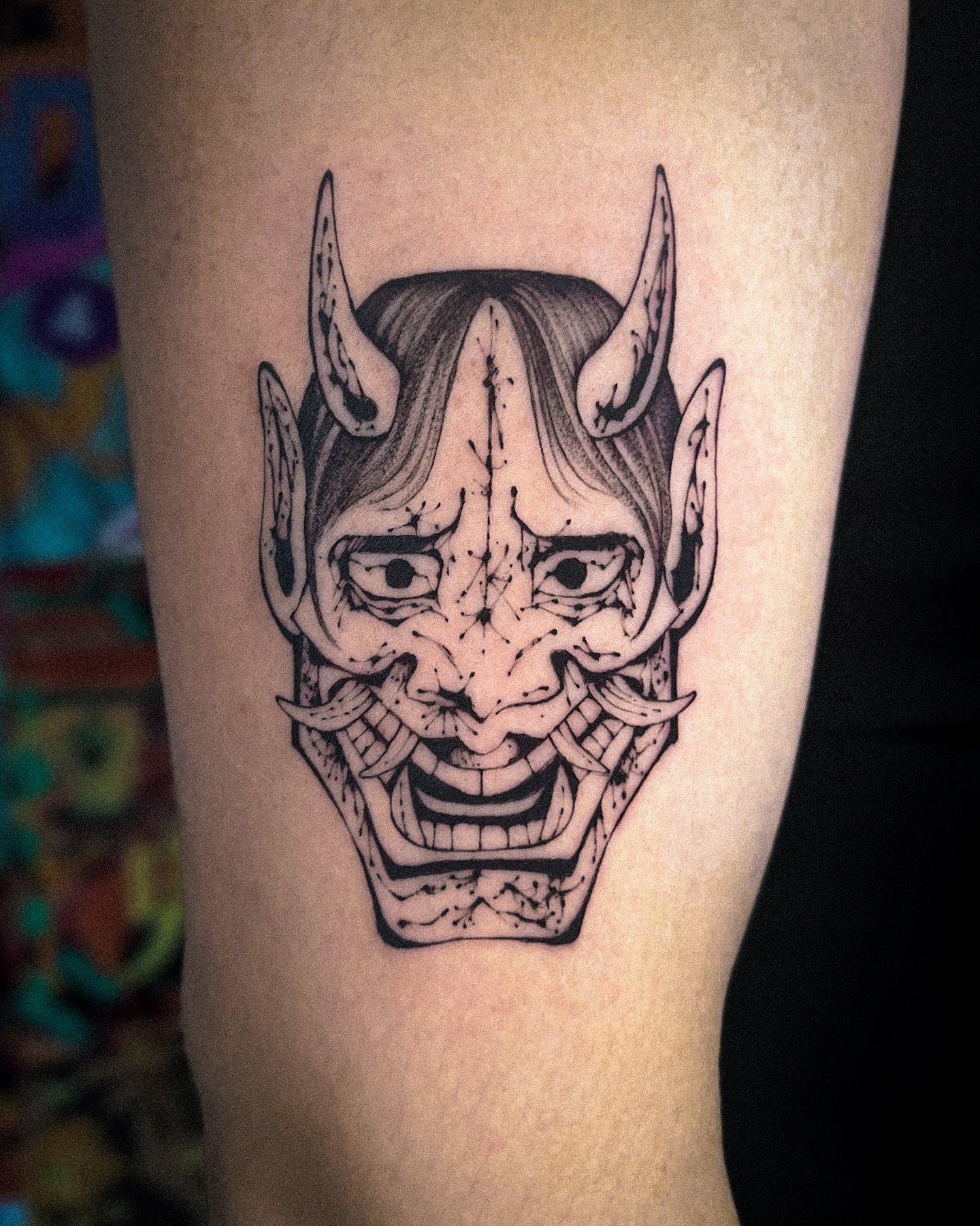 Demon mask black and grey tattoo on the forearm by мια ѕυη