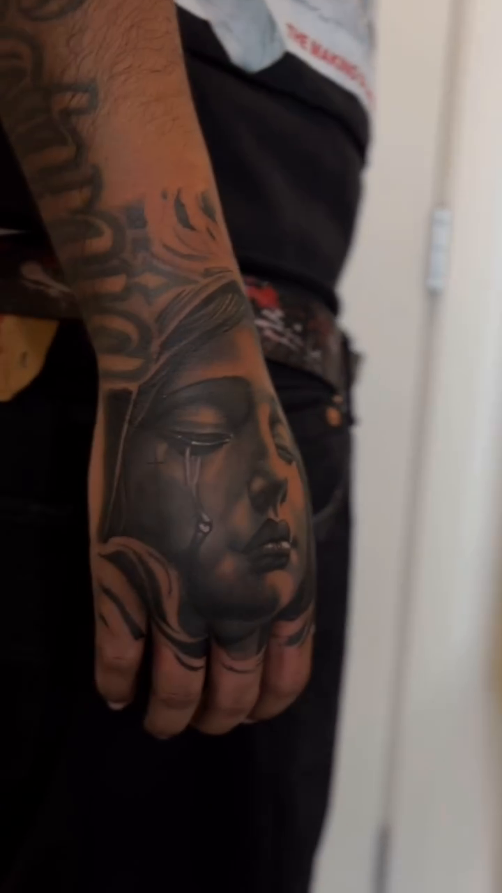 Weeping face realism tattoo by Richie Moreno lll