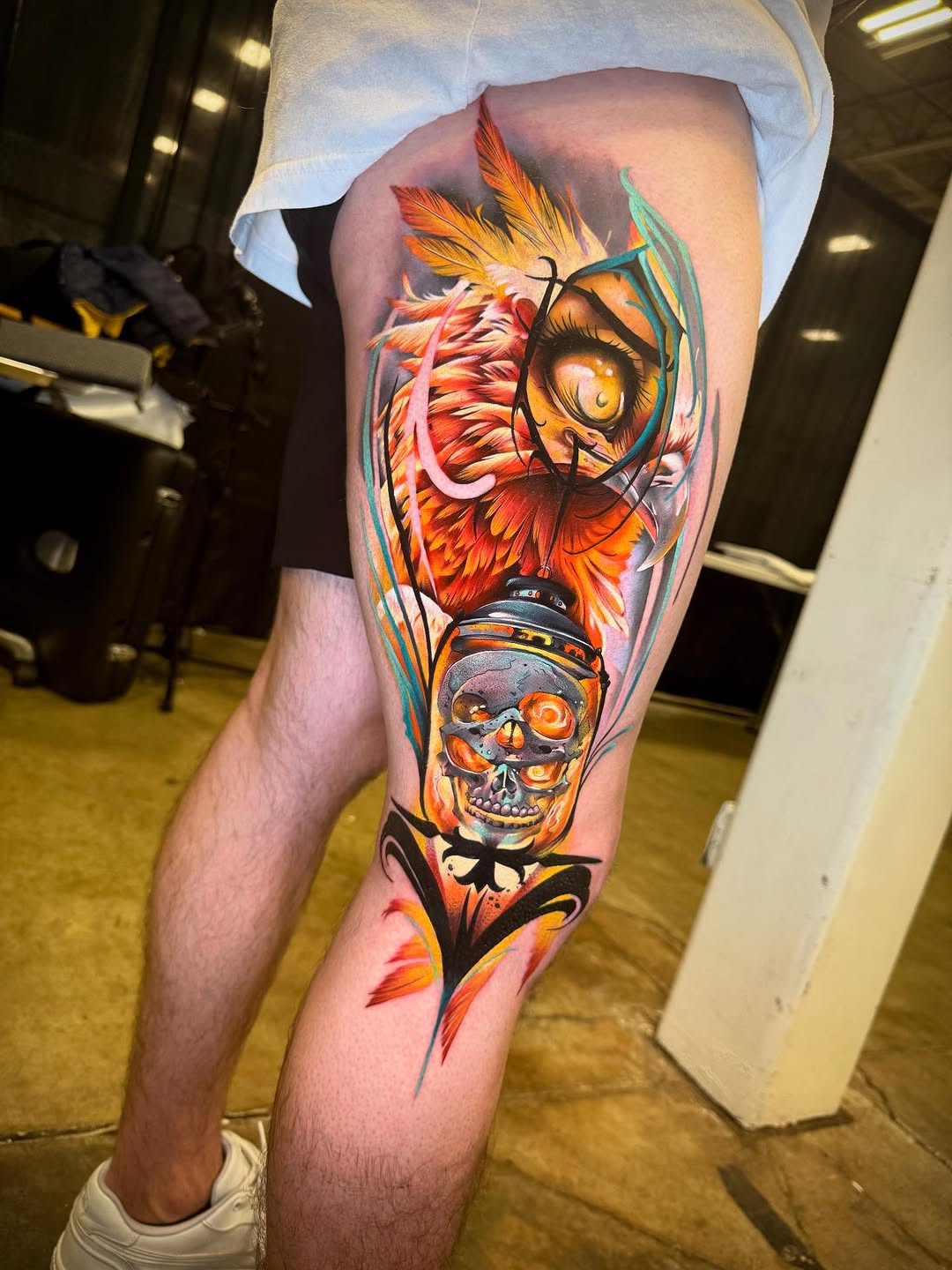 Owl eye and skull lantern surrealism tattoo on the thigh by Franz Muñoz