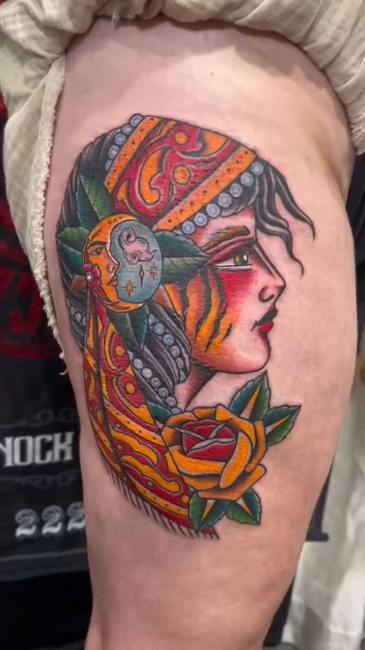 Woman with rose neo-traditional tattoo by Massimiliano pennella