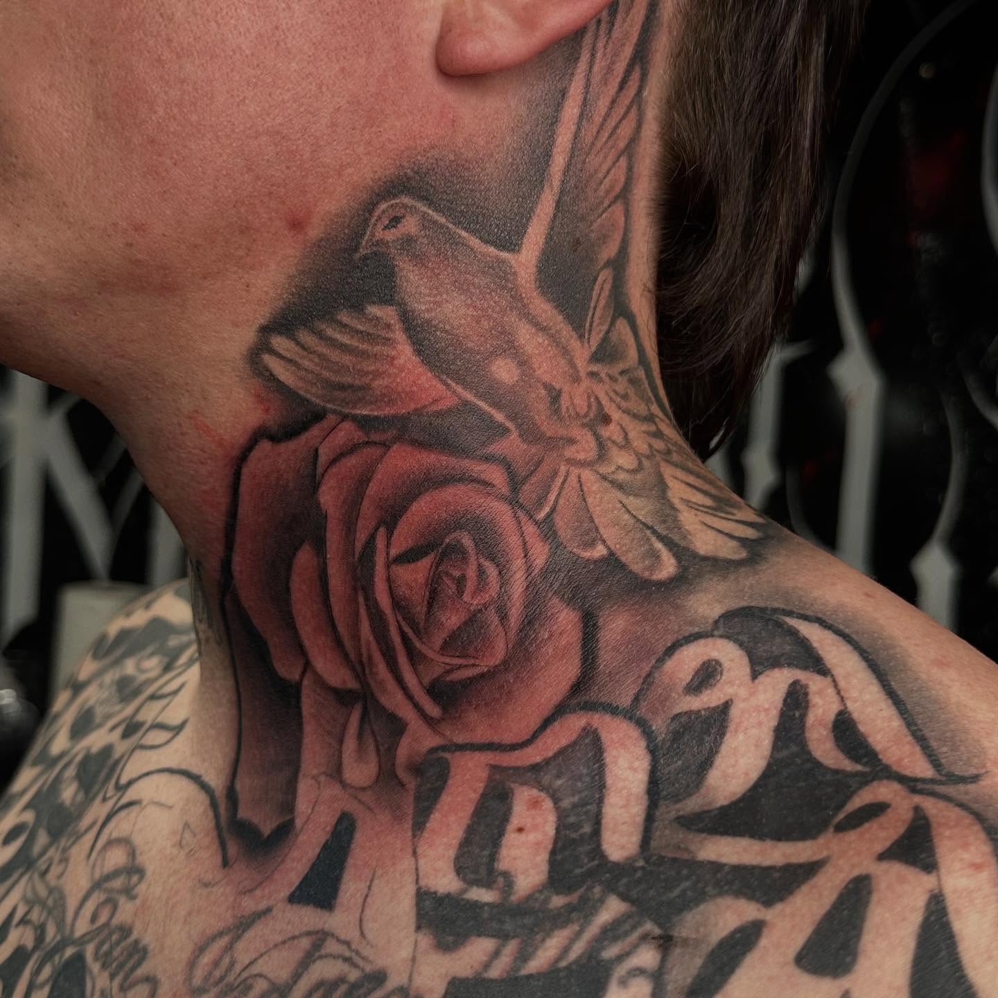 Rose and dove realism tattoo on the neck by Kimberly landin