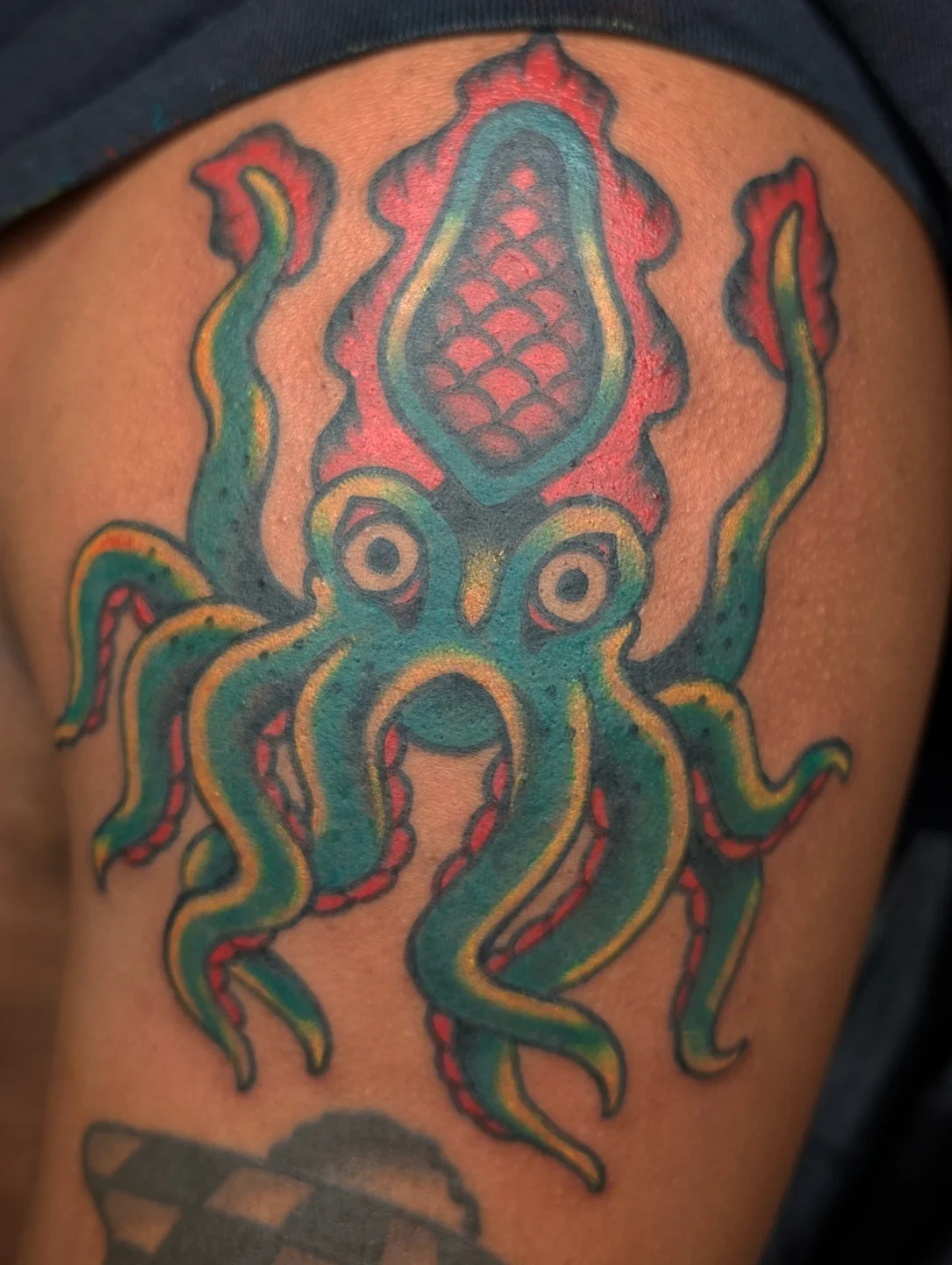 Octopus American traditional tattoo on the thigh by Aiden Krone, San Diego, California