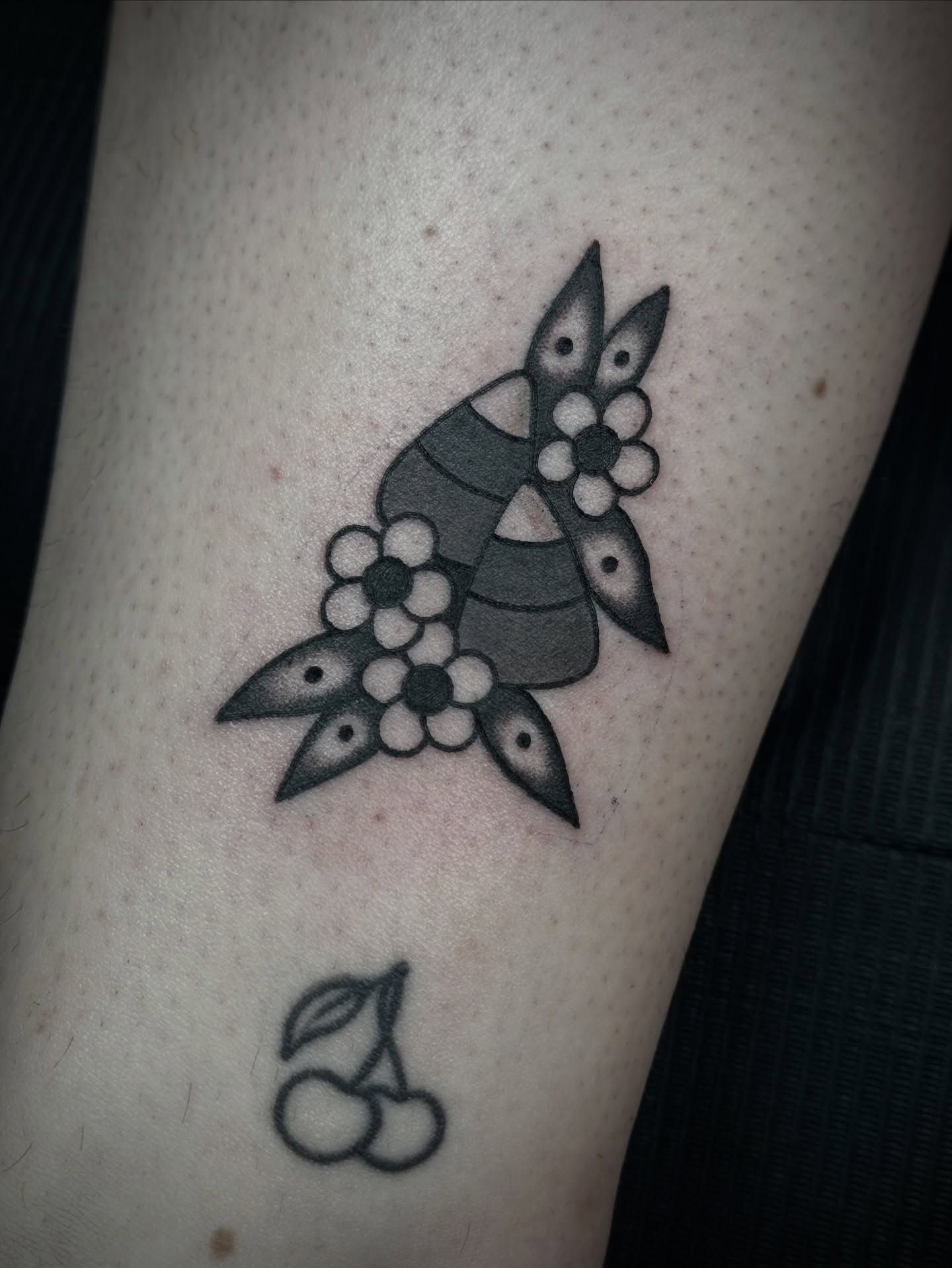 Cherry blossom black and grey tattoo on the forearm by Ally noel