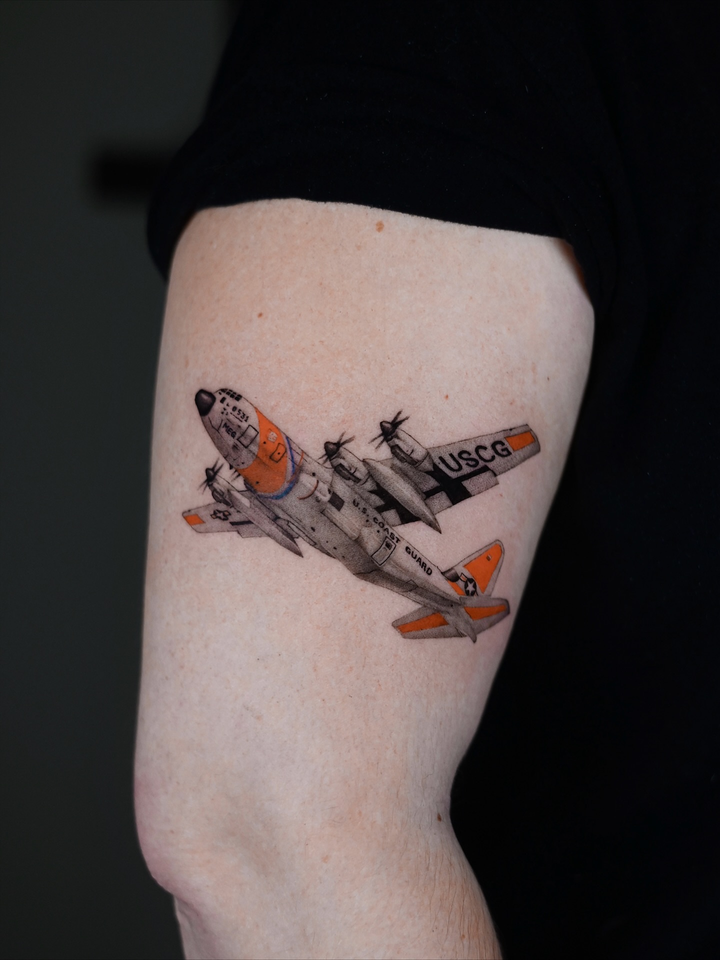 USCG aircraft realism tattoo on the forearm by hiba ⊹ atlanta tattoo artist, Johns Creek, Georgia