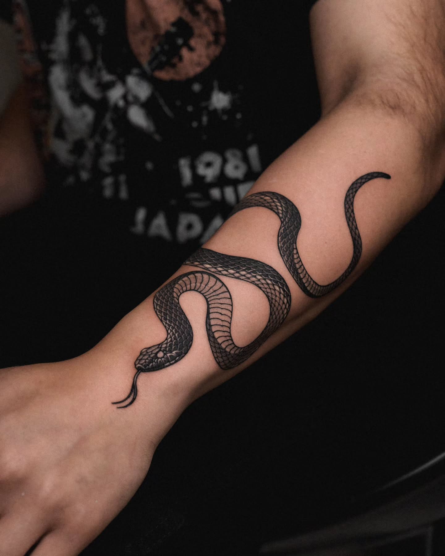 Snake black and grey tattoo on the forearm by 쿠노 Koono snaketattoo