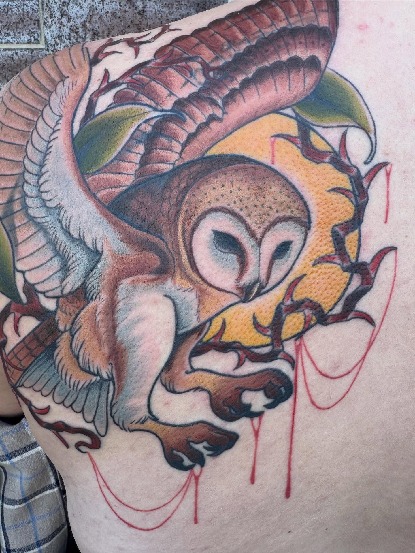 Owl American traditional tattoo on the back by Nikki Powills