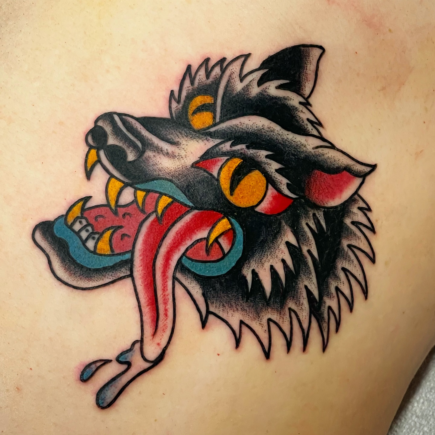 Wolf American traditional tattoo on the thigh by adamsayre, San Diego, California