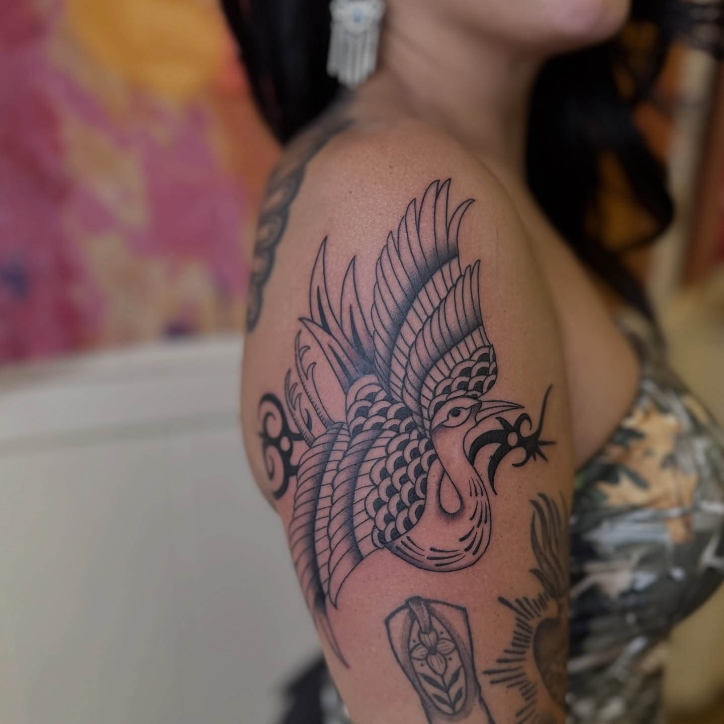 Phoenix black and grey tattoo on the shoulder by Brieana Smith