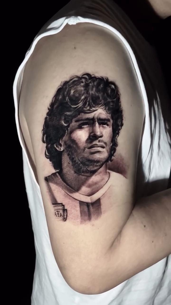 Diego Maradona portrait realism tattoo by Bishop Tattoo