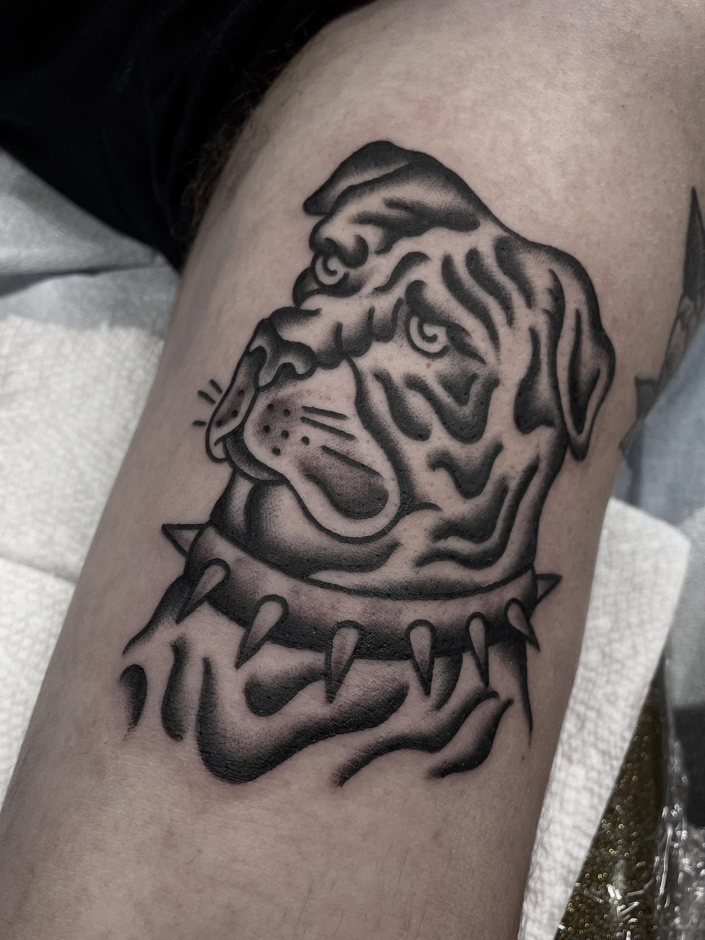 Bulldog black and grey tattoo on the thigh by Kat, Sacramento, California