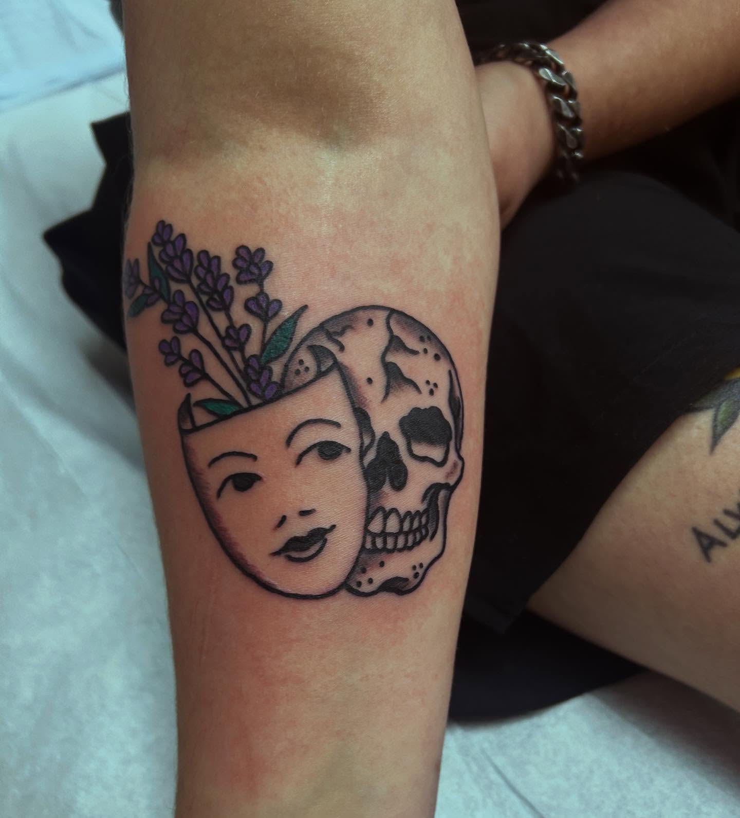 Lady skull lavender American traditional tattoo on the forearm by Elizabeth Niederkorn