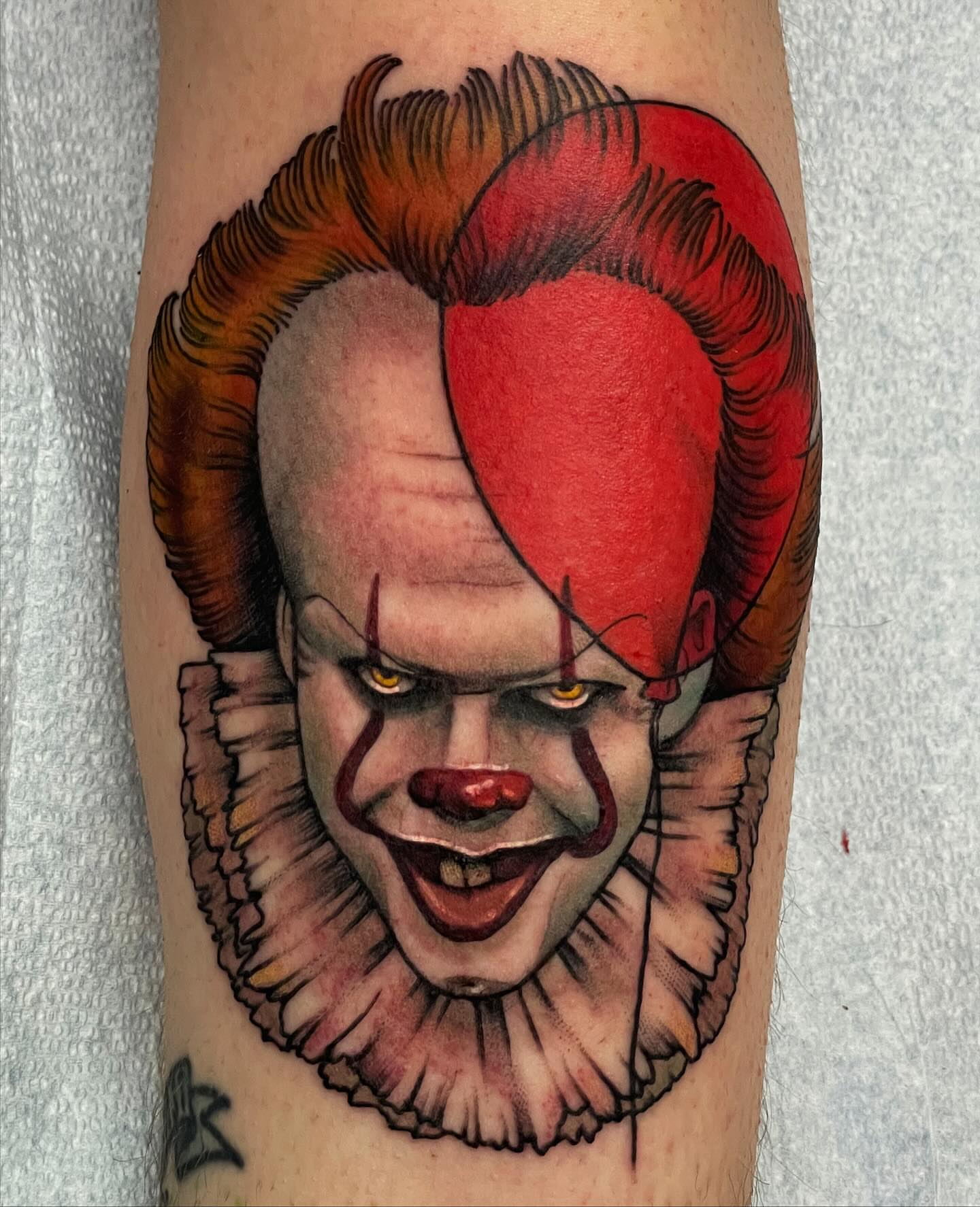 Pennywise realism tattoo on the forearm by Monica Amneus
