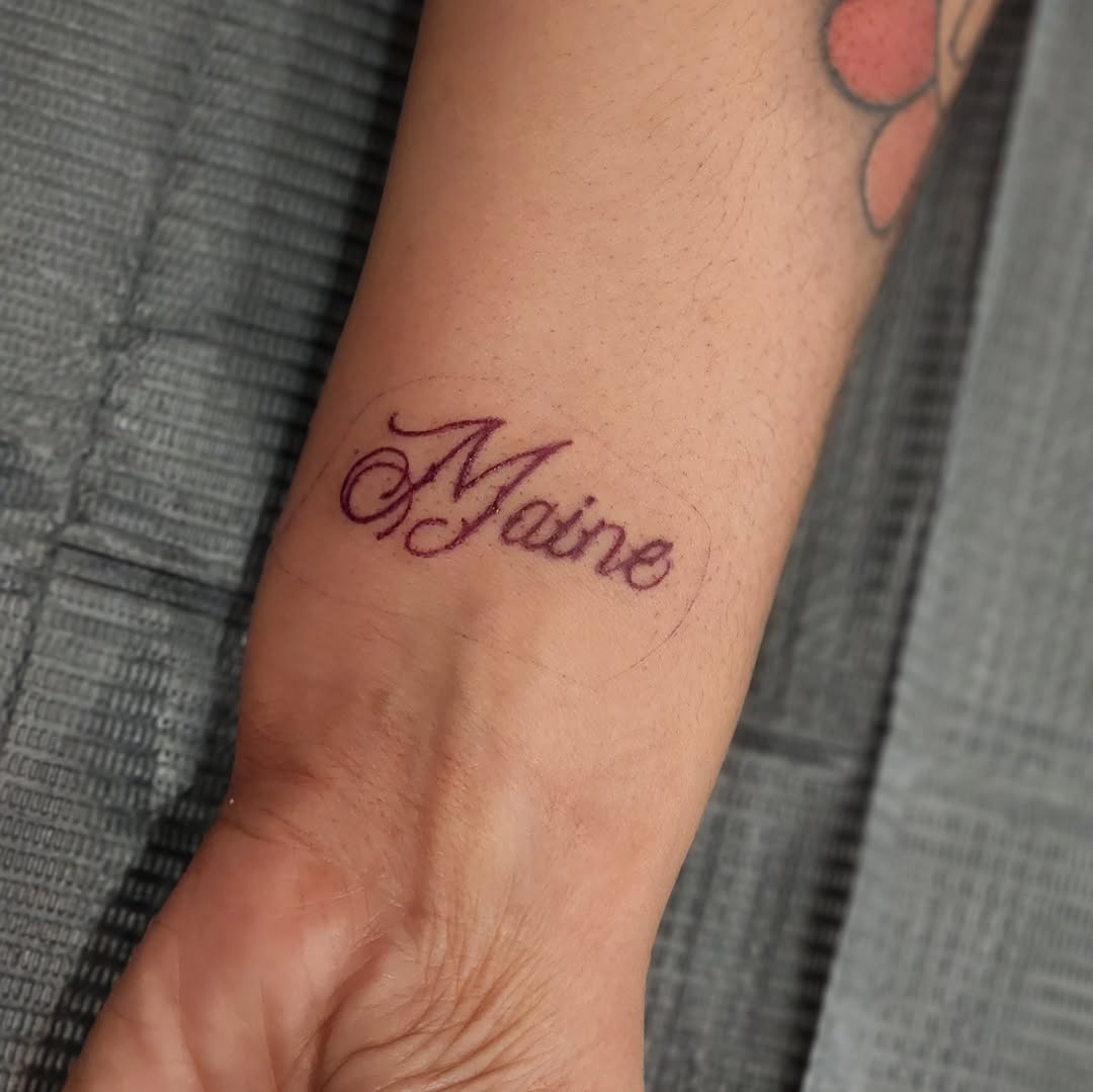 Tattoo by @queenofchaostattoos — lettering_script, fine_line