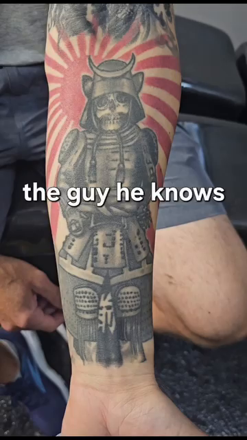 Samurai mask tattoo realism tattoo on the upper arm by Mac Obaob