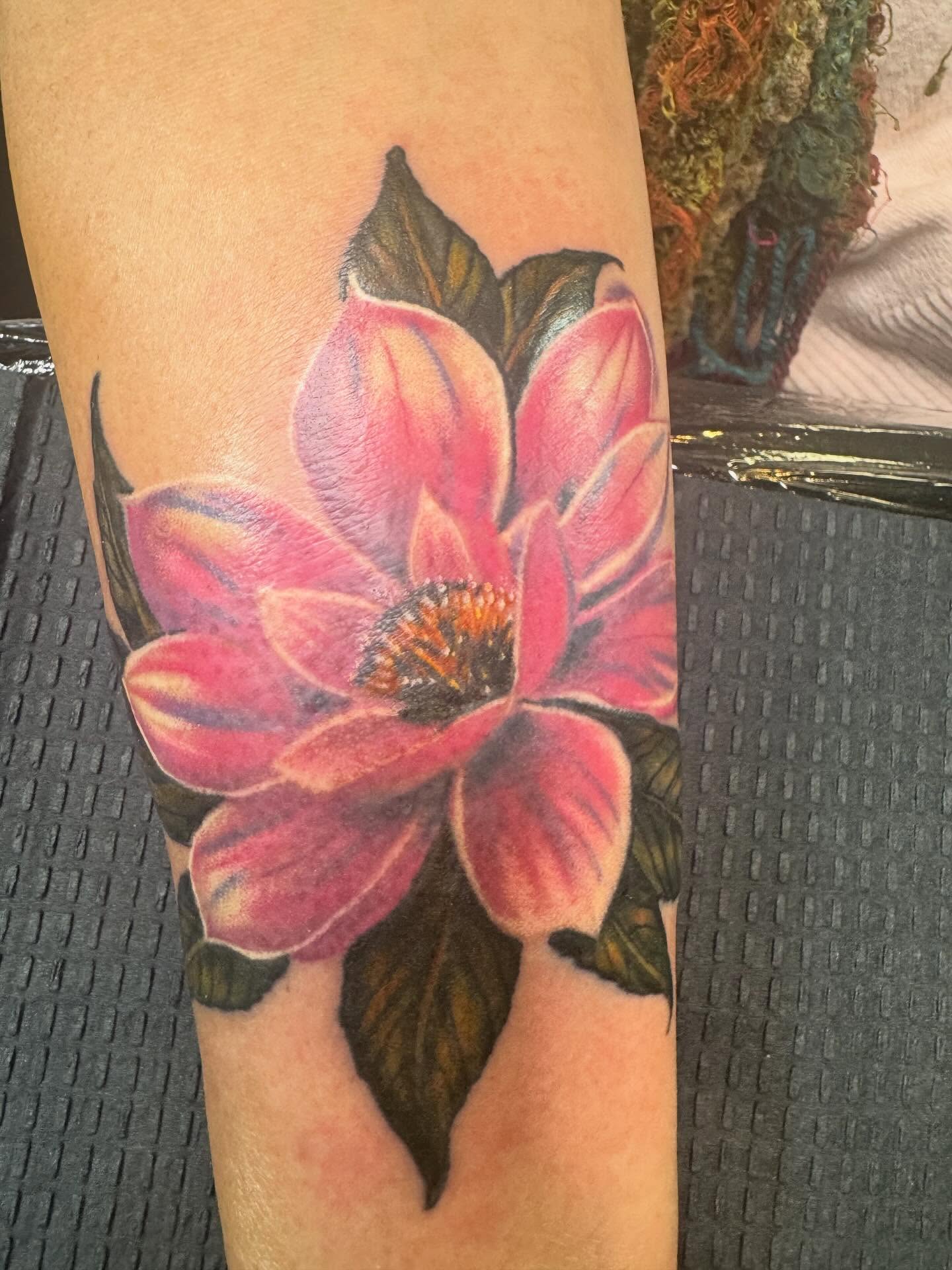 Lotus flower realism tattoo on the forearm by spikecitytattoo