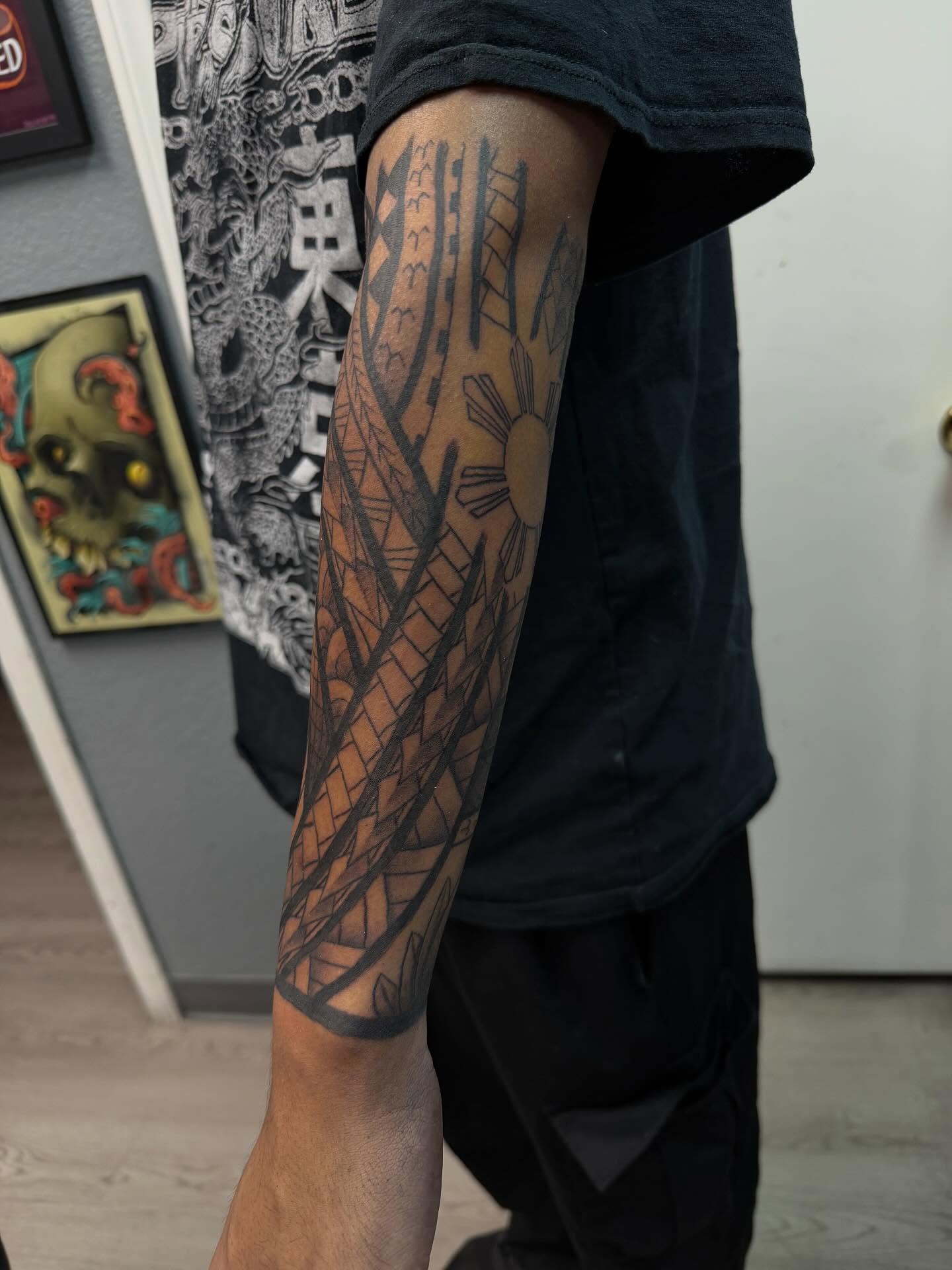 Tribal pattern tribal tattoo on the forearm by Kevin, Las Vegas, Nevada