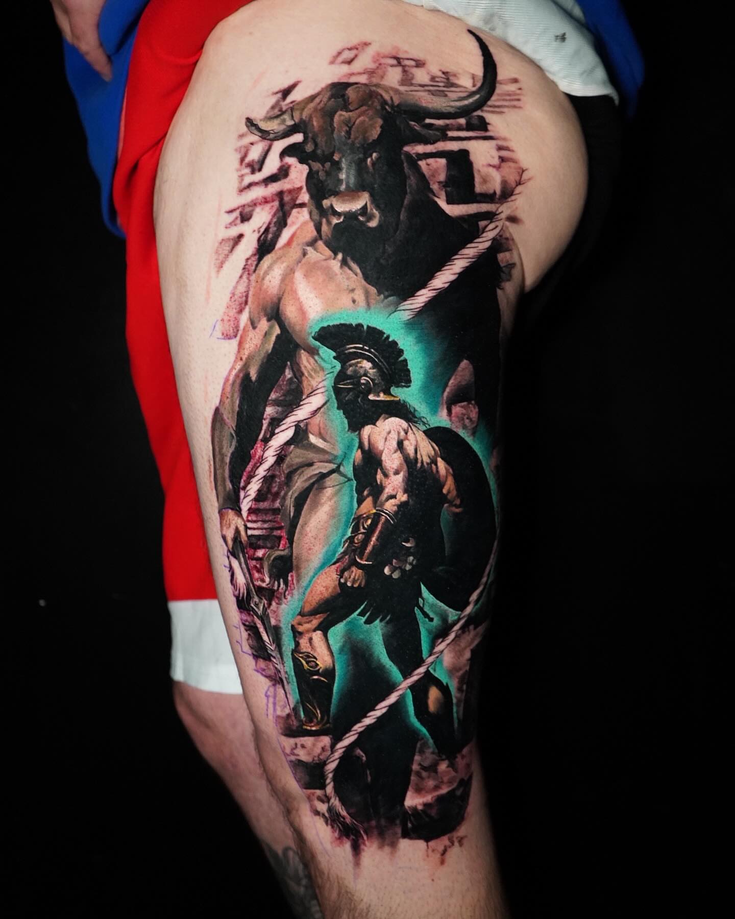 Gladiator and bull realism tattoo on the thigh by Darl Gnau