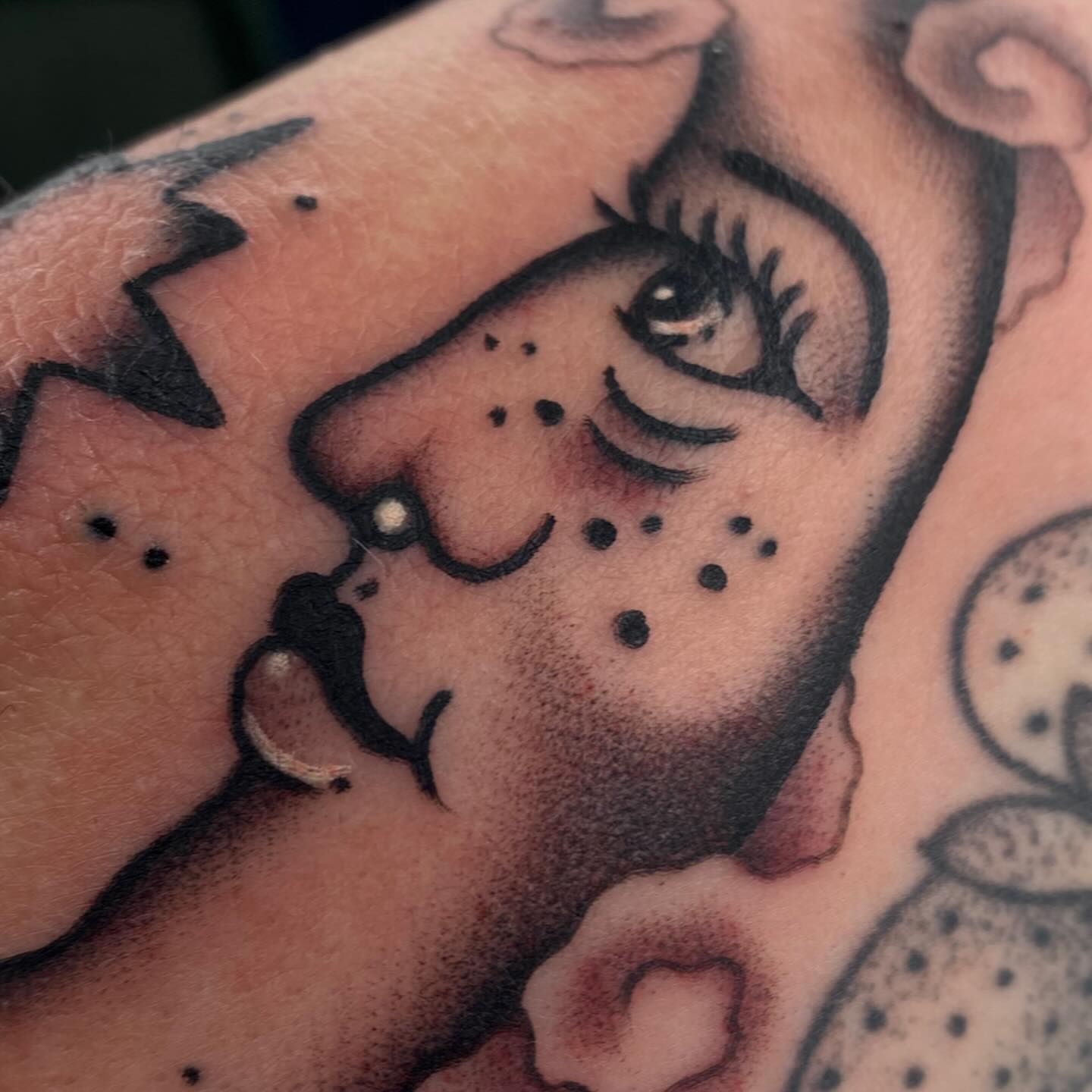 Woman's face dotwork tattoo on the forearm by Justin R. Mitchell, Fort Worth, Texas