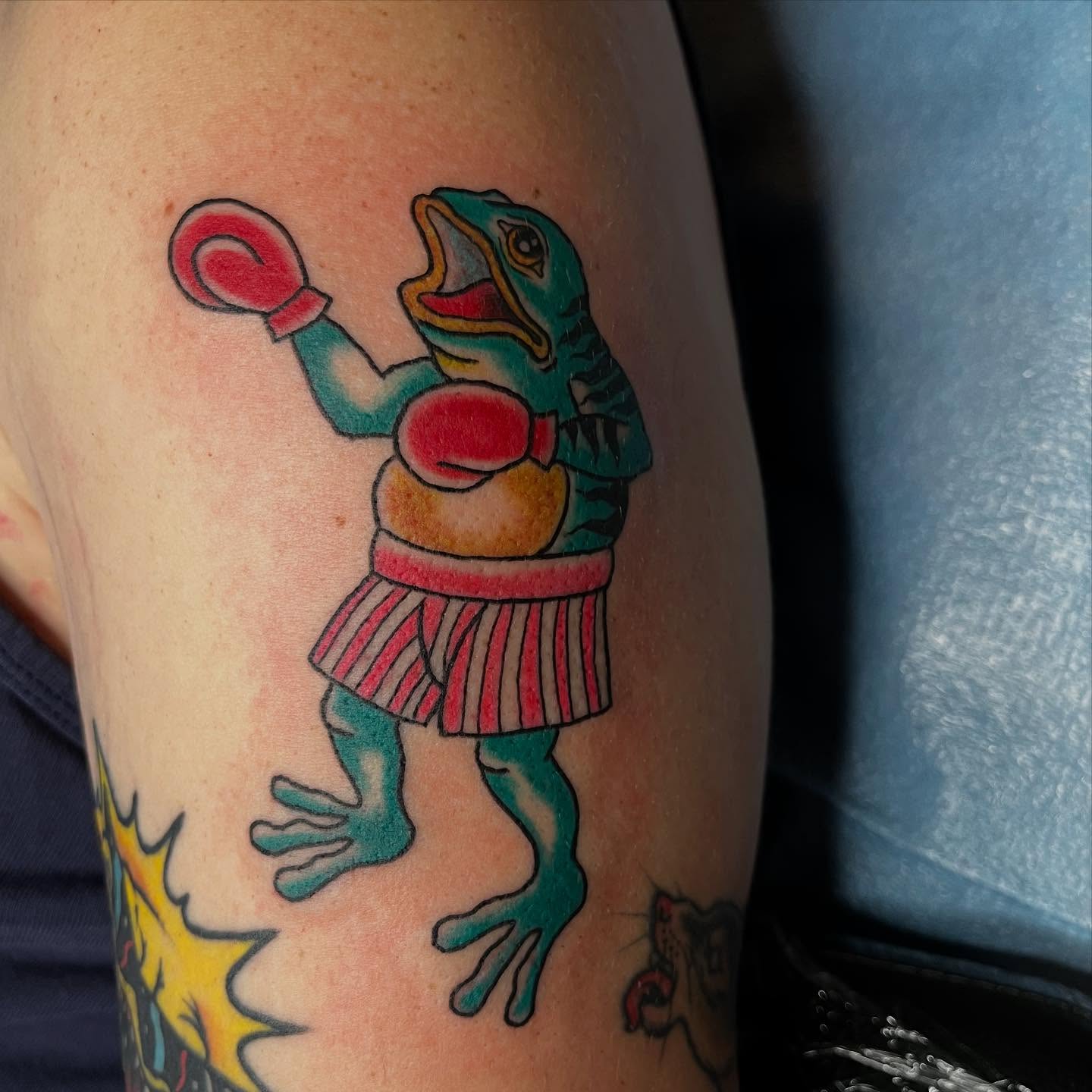 Boxing frog American traditional tattoo on the forearm by Mariah Nguyen