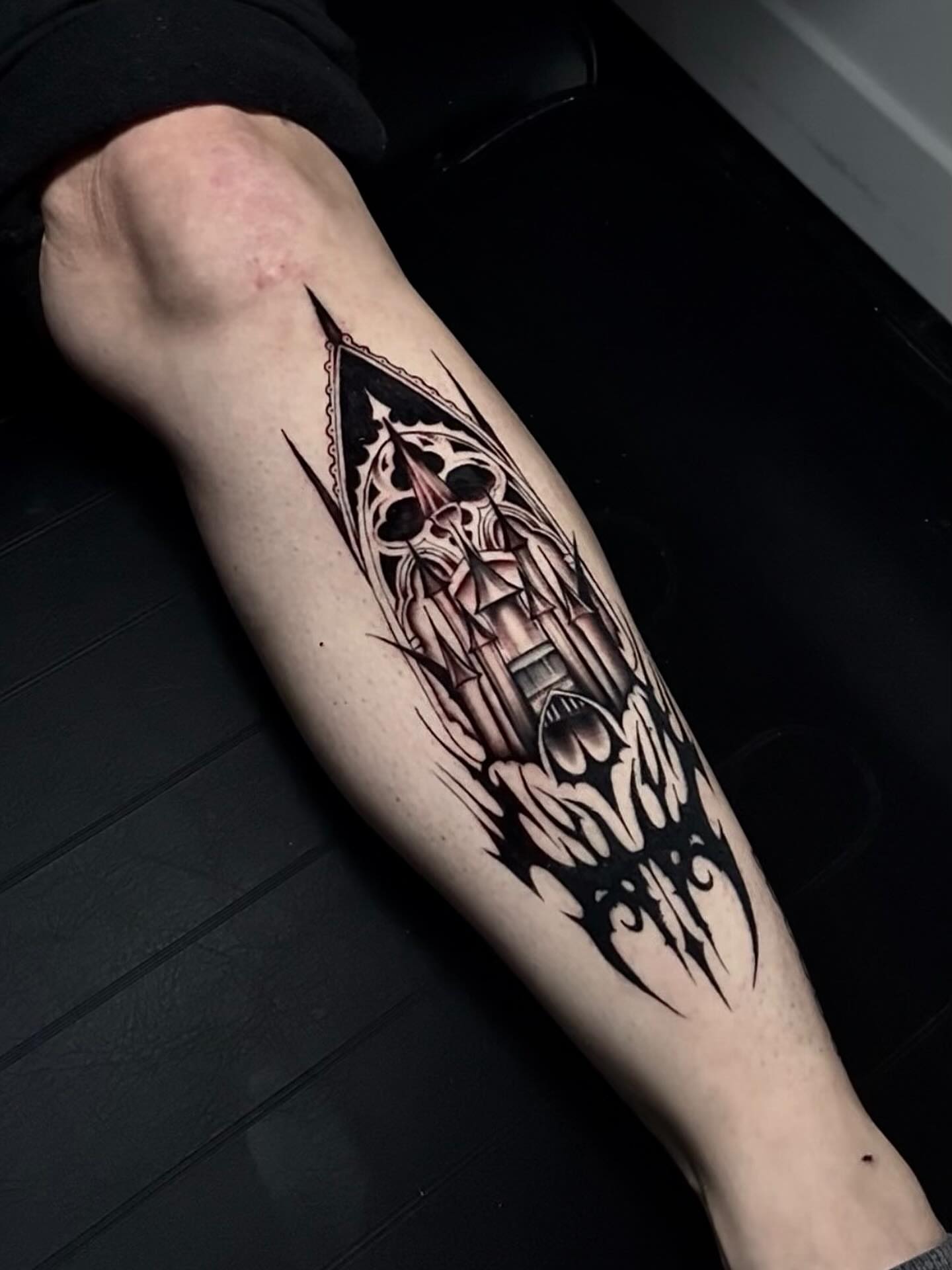 Gothic cathedral geometric tattoo on the forearm by Turk