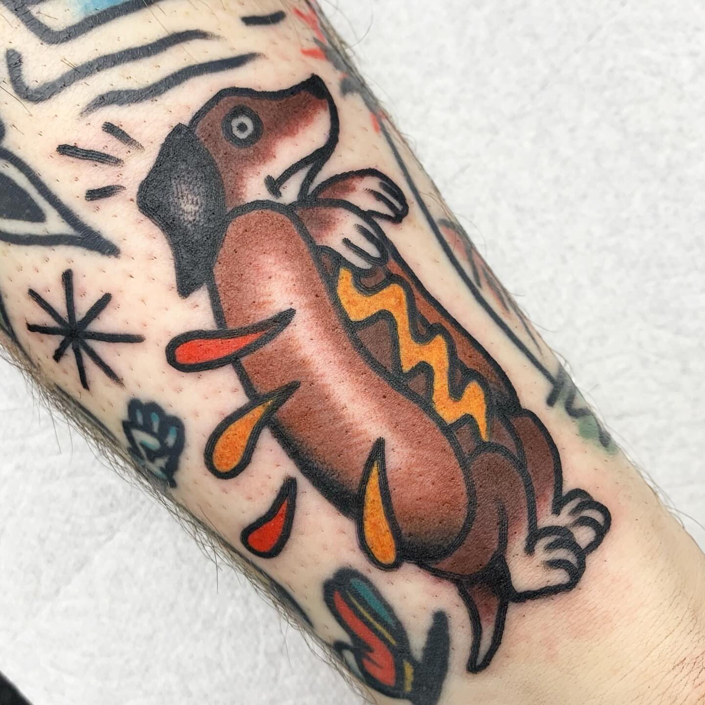 Hot dog American traditional tattoo on the forearm by Los Angeles Tattoo Artist