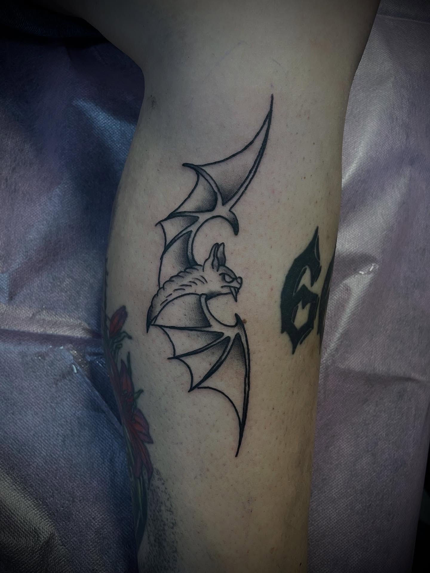 Bat black and grey tattoo on the forearm by Kaylee 🗡️