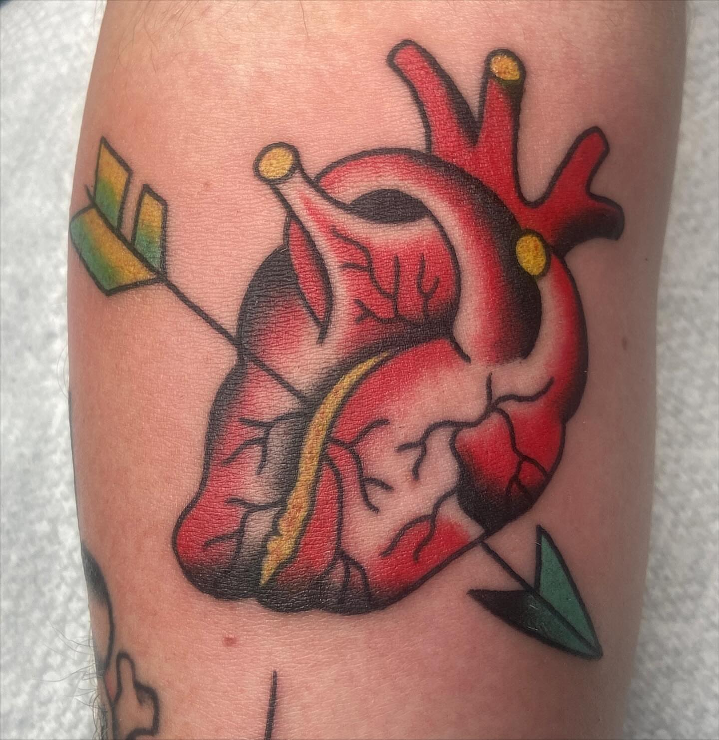 Heart with arrow American traditional tattoo on the forearm by nicholas mcevoy, Boston, Massachusetts