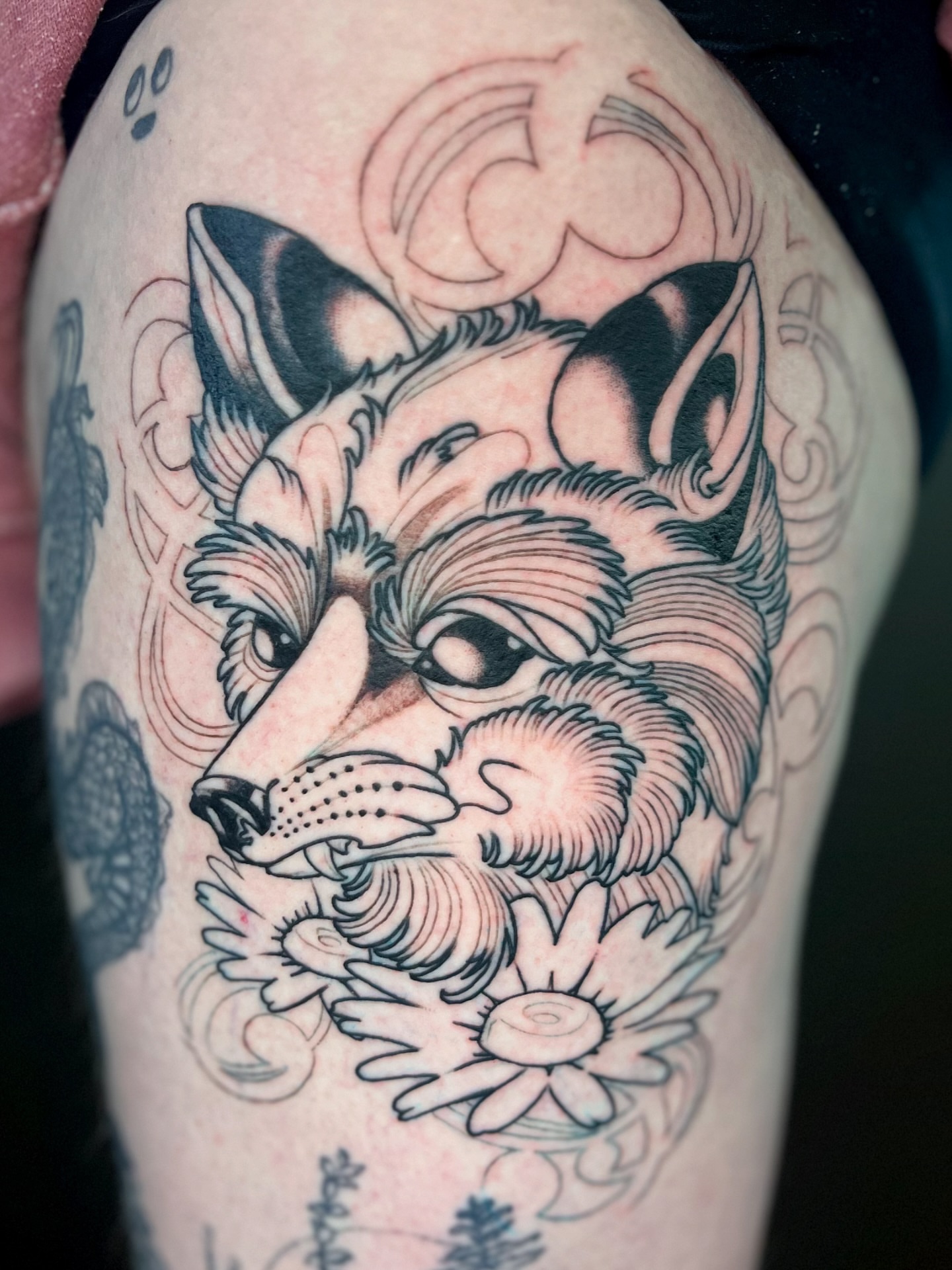 Wolf realism tattoo on the thigh by Brennan Freemantle