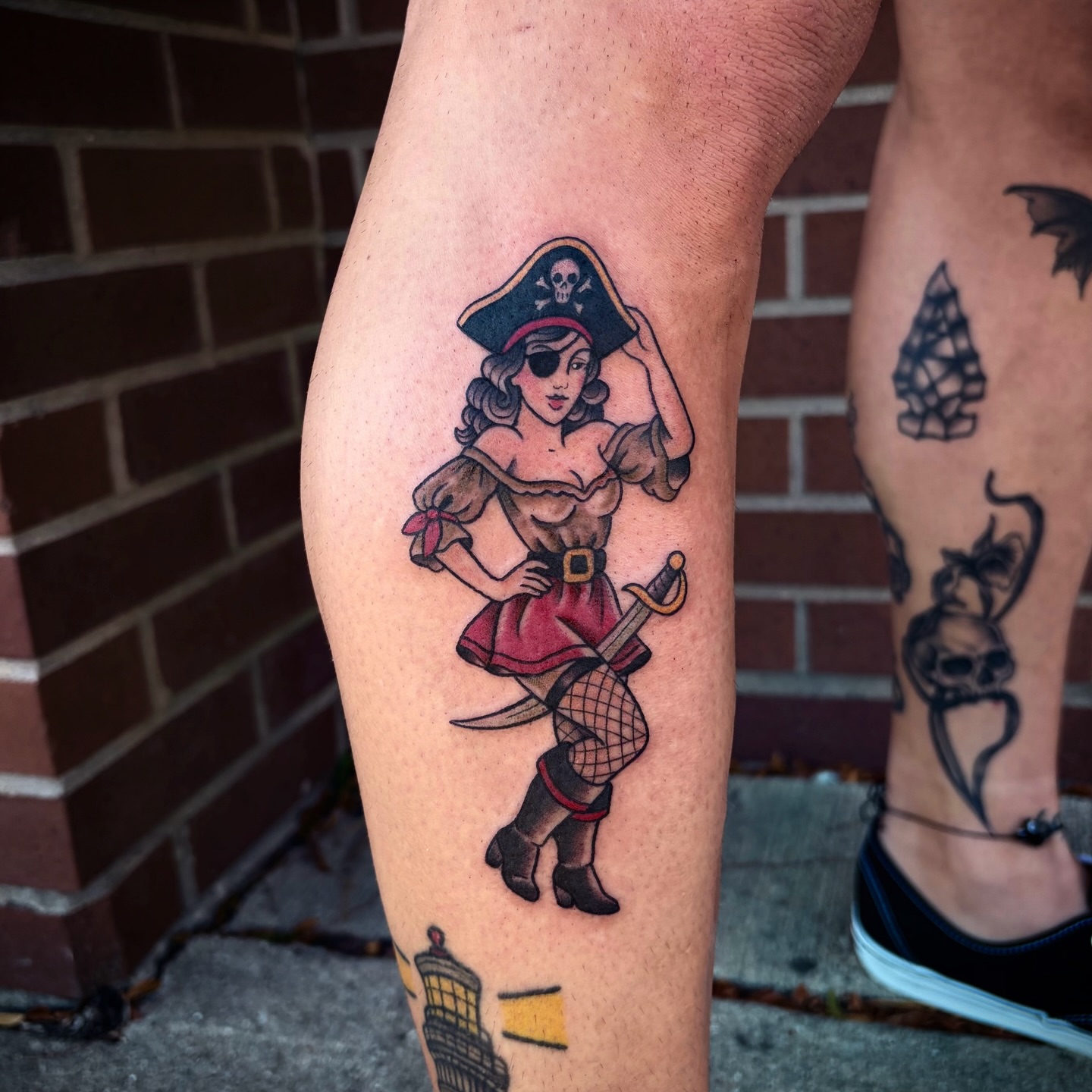 Pirate pin-up girl American traditional tattoo on the thigh by Lauren Dempsey, Dearborn, Michigan