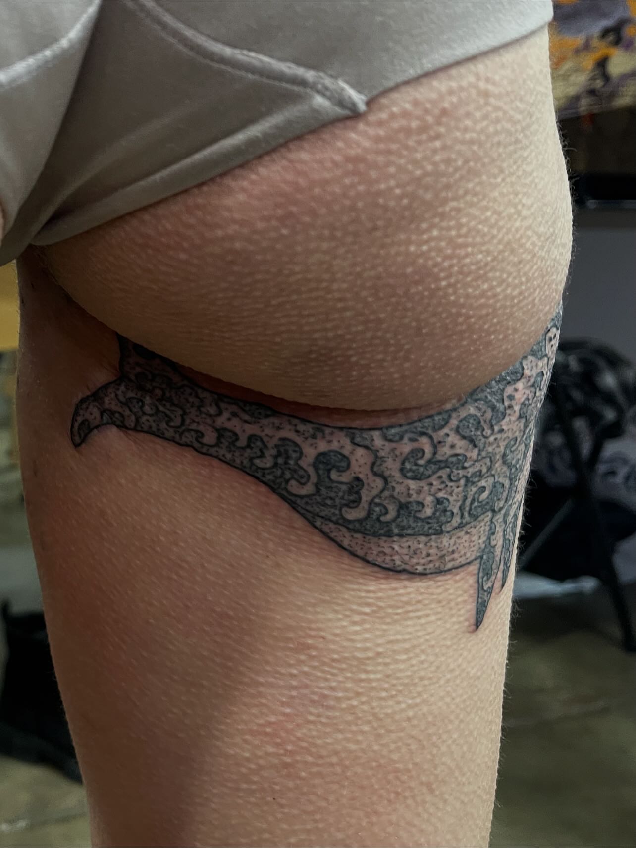 Whale black and grey tattoo on the thigh by Don Juan