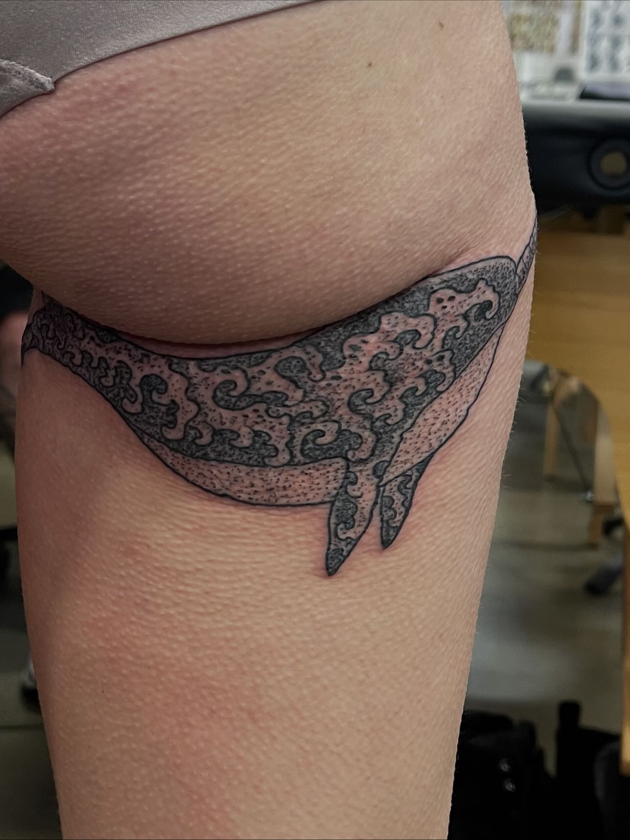 Whale dotwork tattoo on the thigh by Don Juan