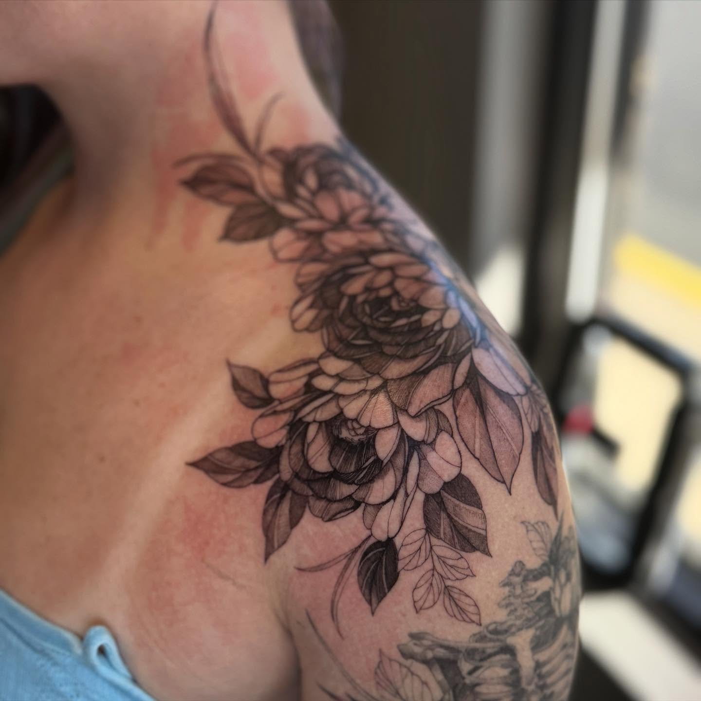 Floral bouquet black and grey tattoo on the shoulder by ❀ Moo, Mount Laurel, New Jersey