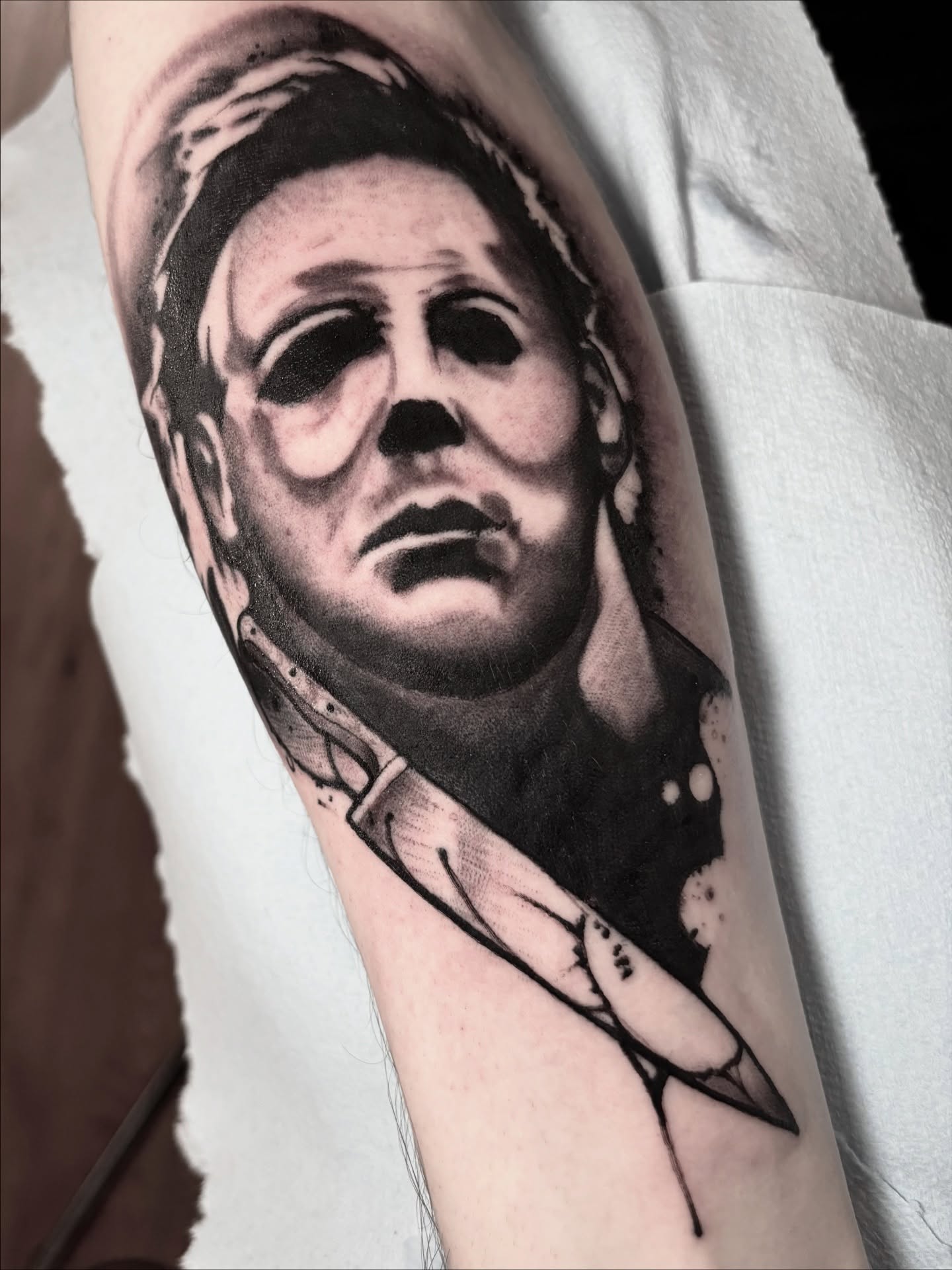 Michael Myers mask realism tattoo on the forearm by Matt Stolzenburg