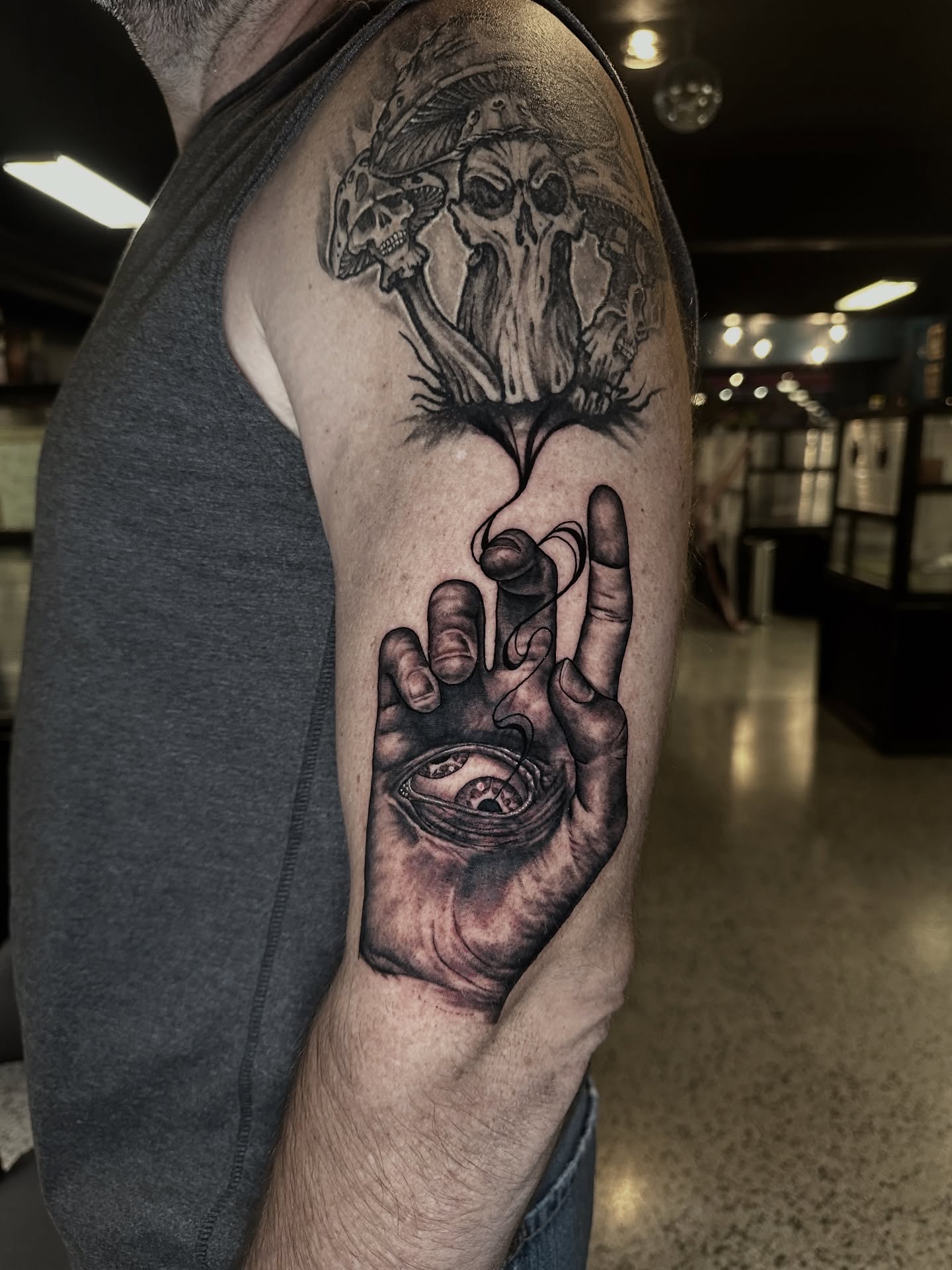 Eye in hand realism tattoo on the forearm by (Joshua) Van Cummings
