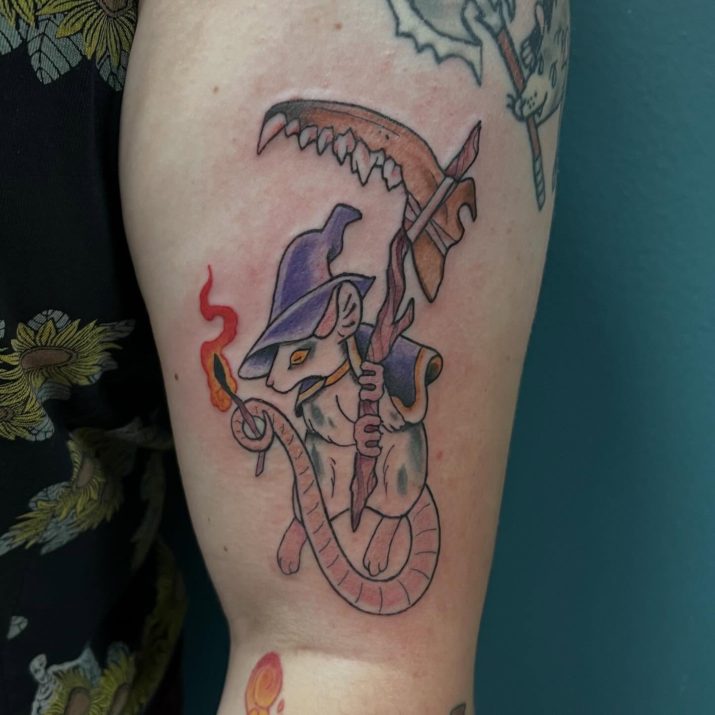 Cat with scythe American traditional tattoo on the forearm by Callie πͺ