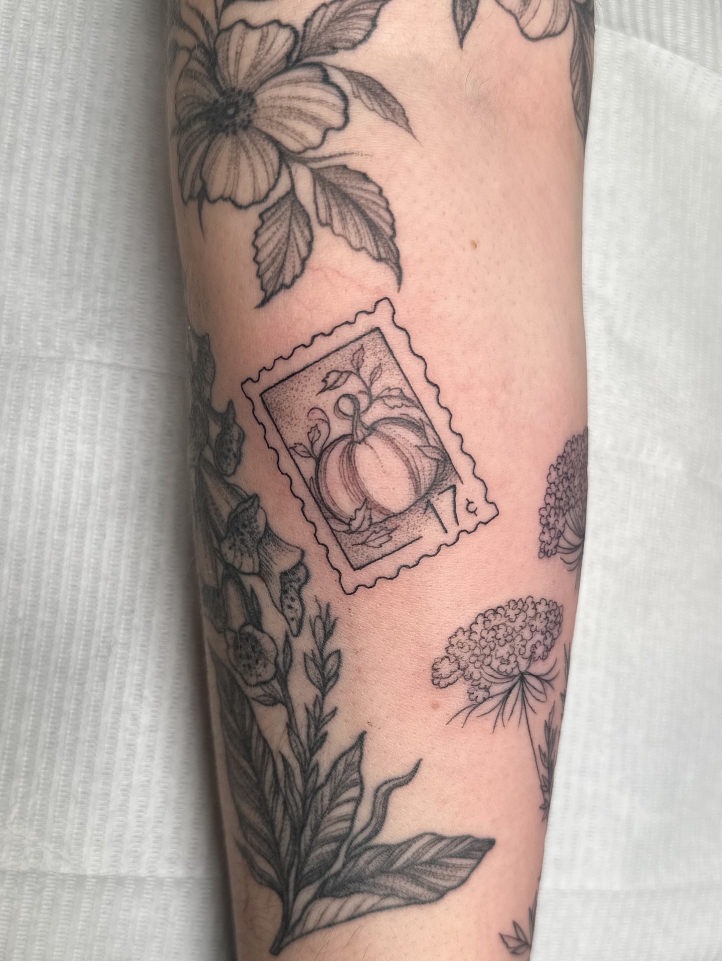 Peach stamp black and grey tattoo on the forearm by ๐ฐ๐๐ข๐๐๐ ๐๐ฃ๐๐๐๐ข๐ชฟ