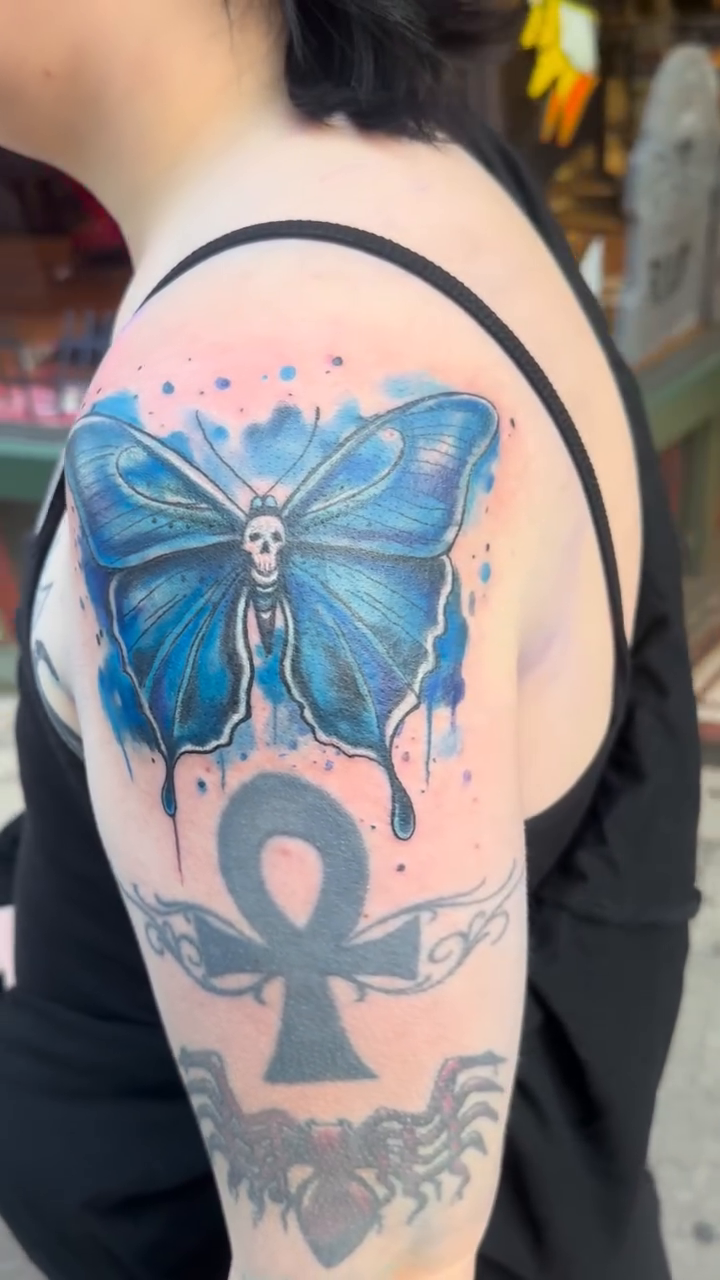 Butterfly and ankh realism tattoo by Misty Dawn Brothers, Dayton, Ohio